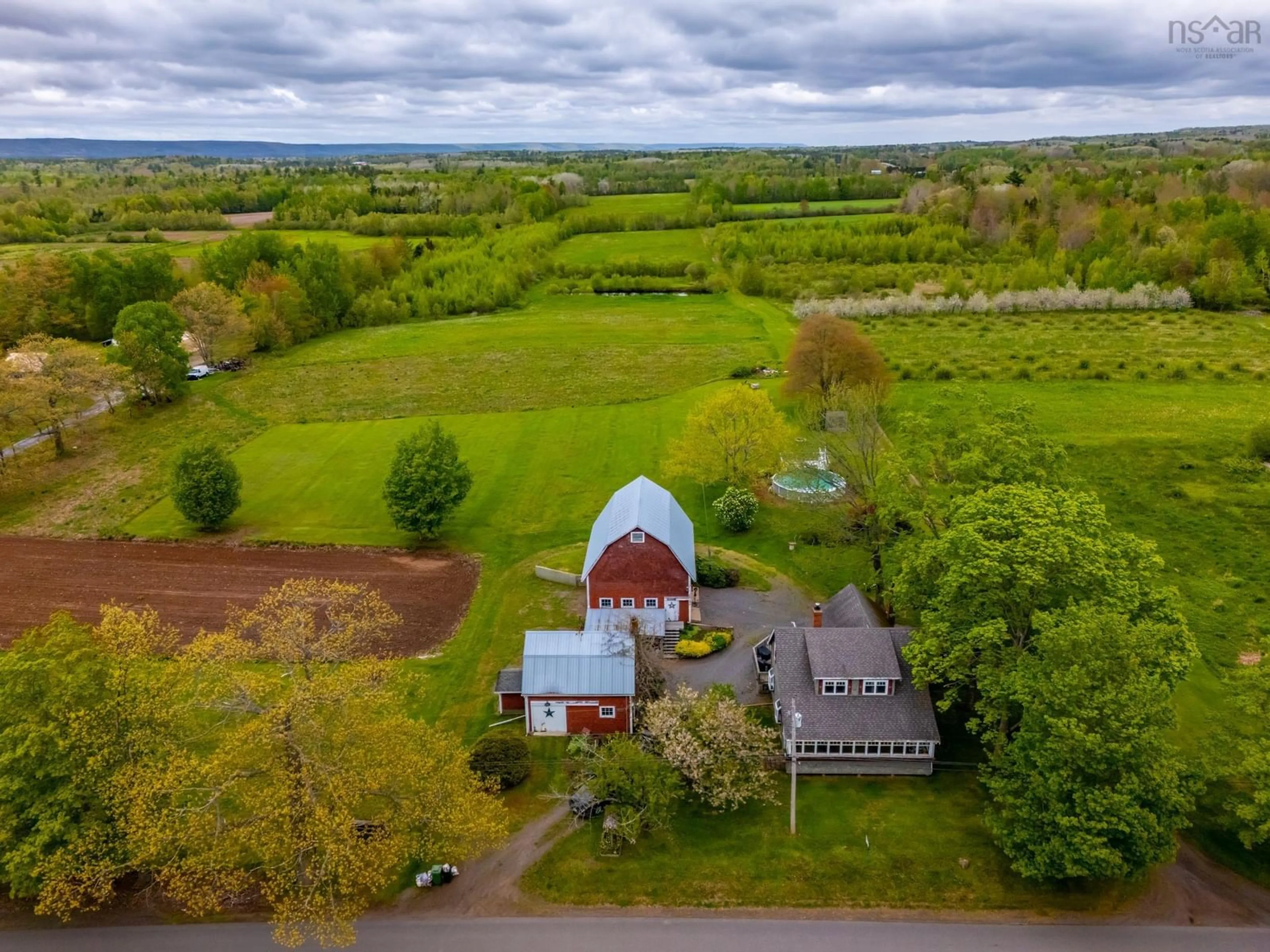 A pic from outside/outdoor area/front of a property/back of a property/a pic from drone, unknown for 6994 Aylesford Rd, Factorydale Nova Scotia B0P 1C0