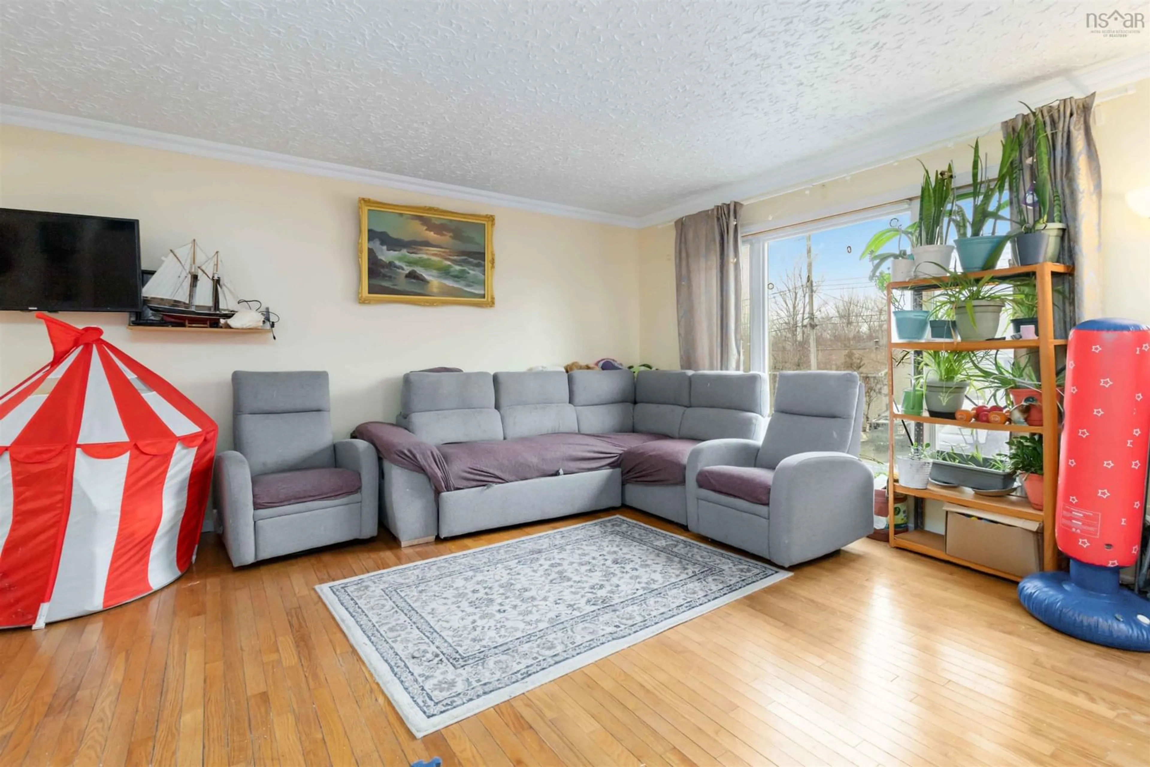 Living room with furniture, unknown for 1570 Riverside Dr, Lower Sackville Nova Scotia B4C 2Y8