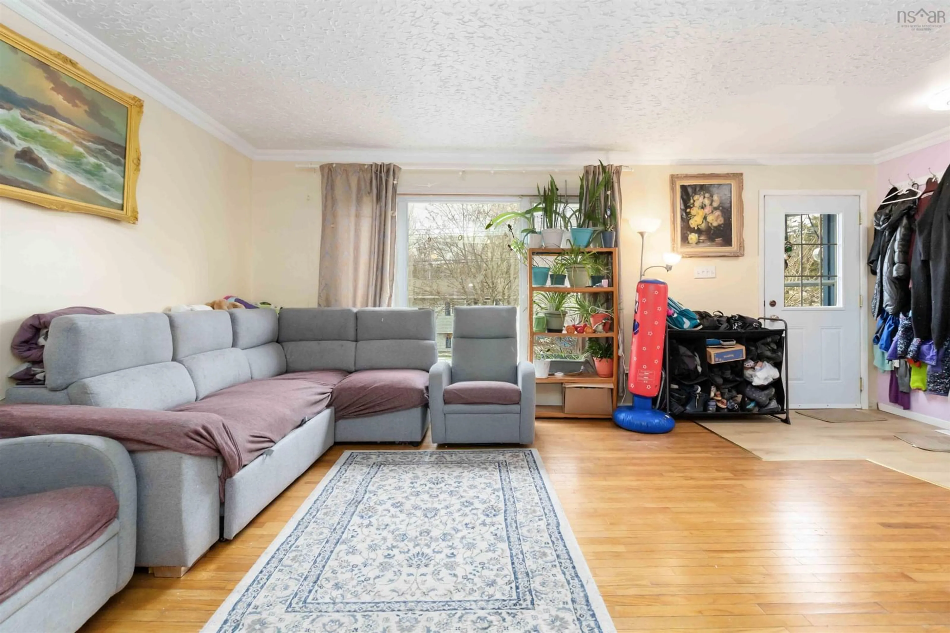 Living room with furniture, unknown for 1570 Riverside Dr, Lower Sackville Nova Scotia B4C 2Y8