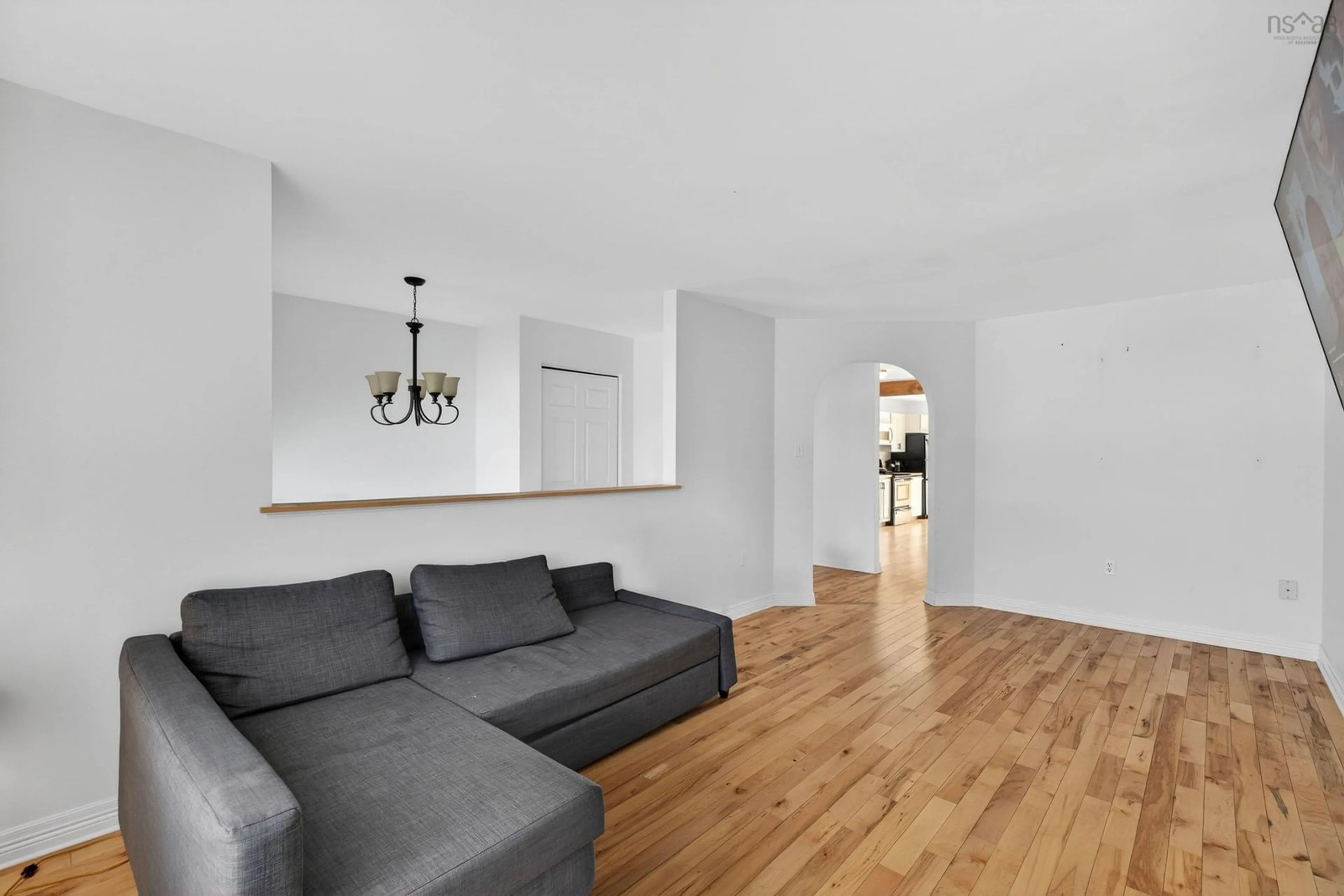 Living room with furniture, wood/laminate floor for 38 Evans Ave, Halifax Nova Scotia B3M 1C2