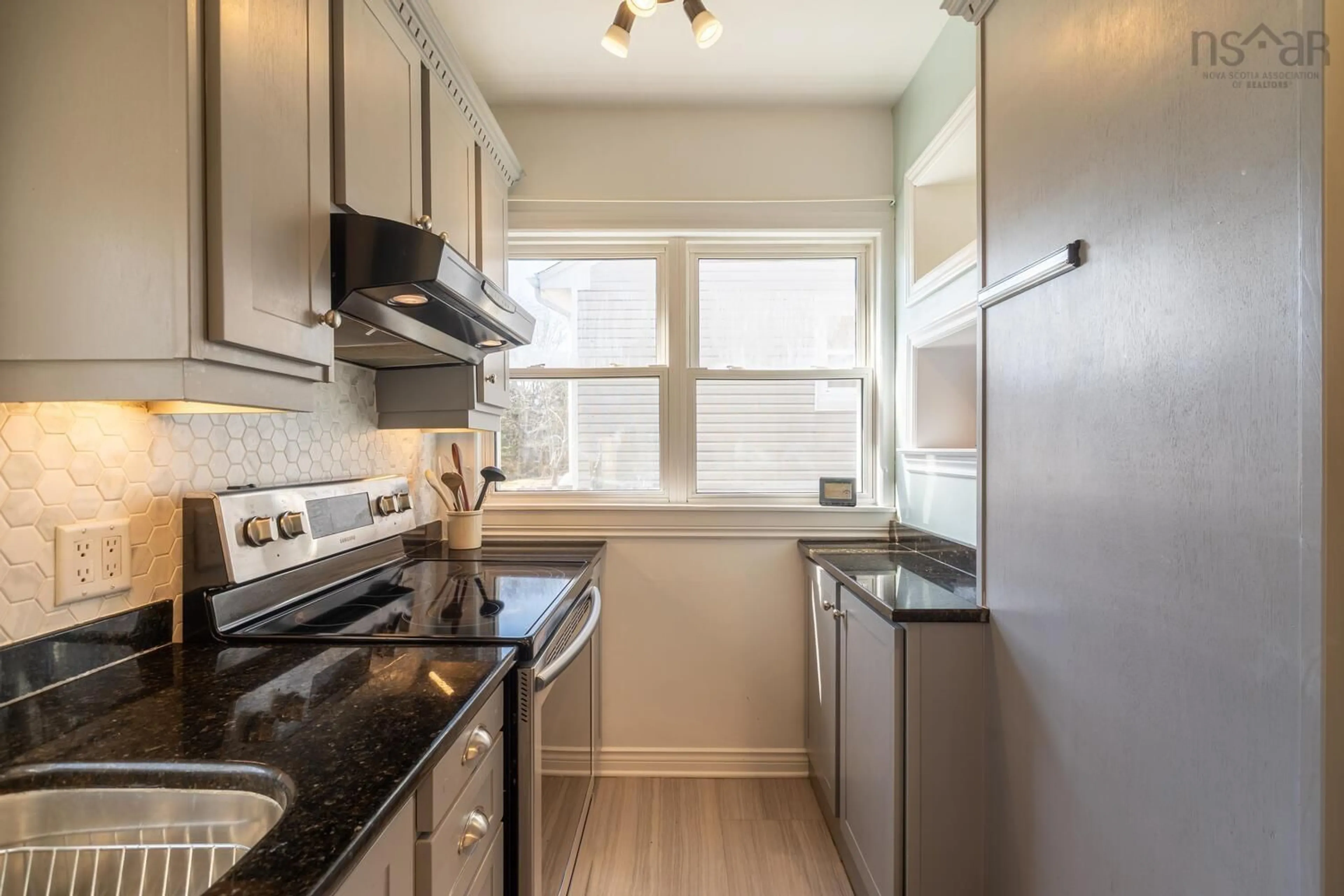 Standard kitchen, wood/laminate floor for 20 Avon Cres, Halifax Nova Scotia B3R 2E3