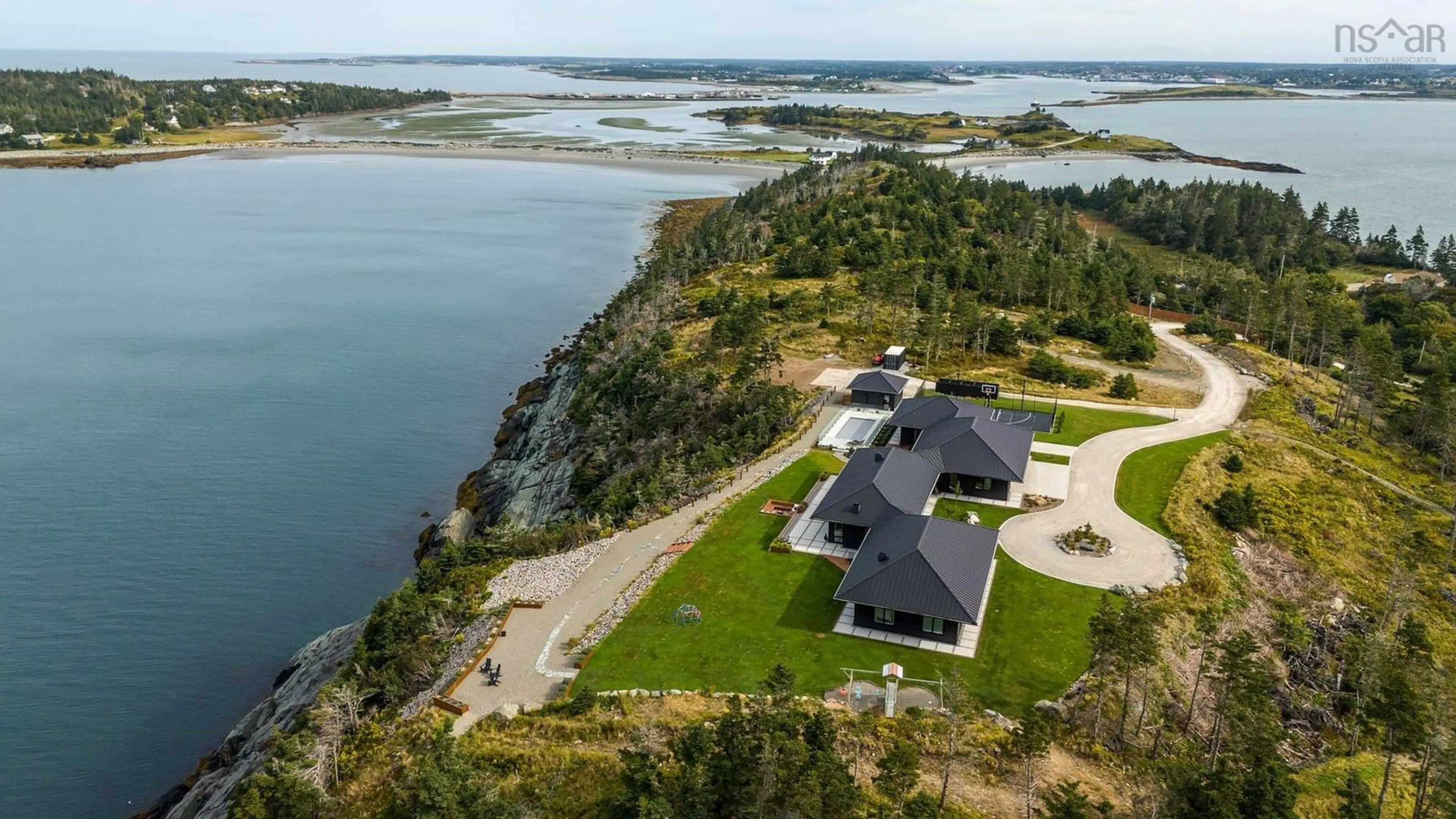 A pic from outside/outdoor area/front of a property/back of a property/a pic from drone, water/lake/river/ocean view for 1766 Highway 304, Cape Forchu Nova Scotia B5A 5G7