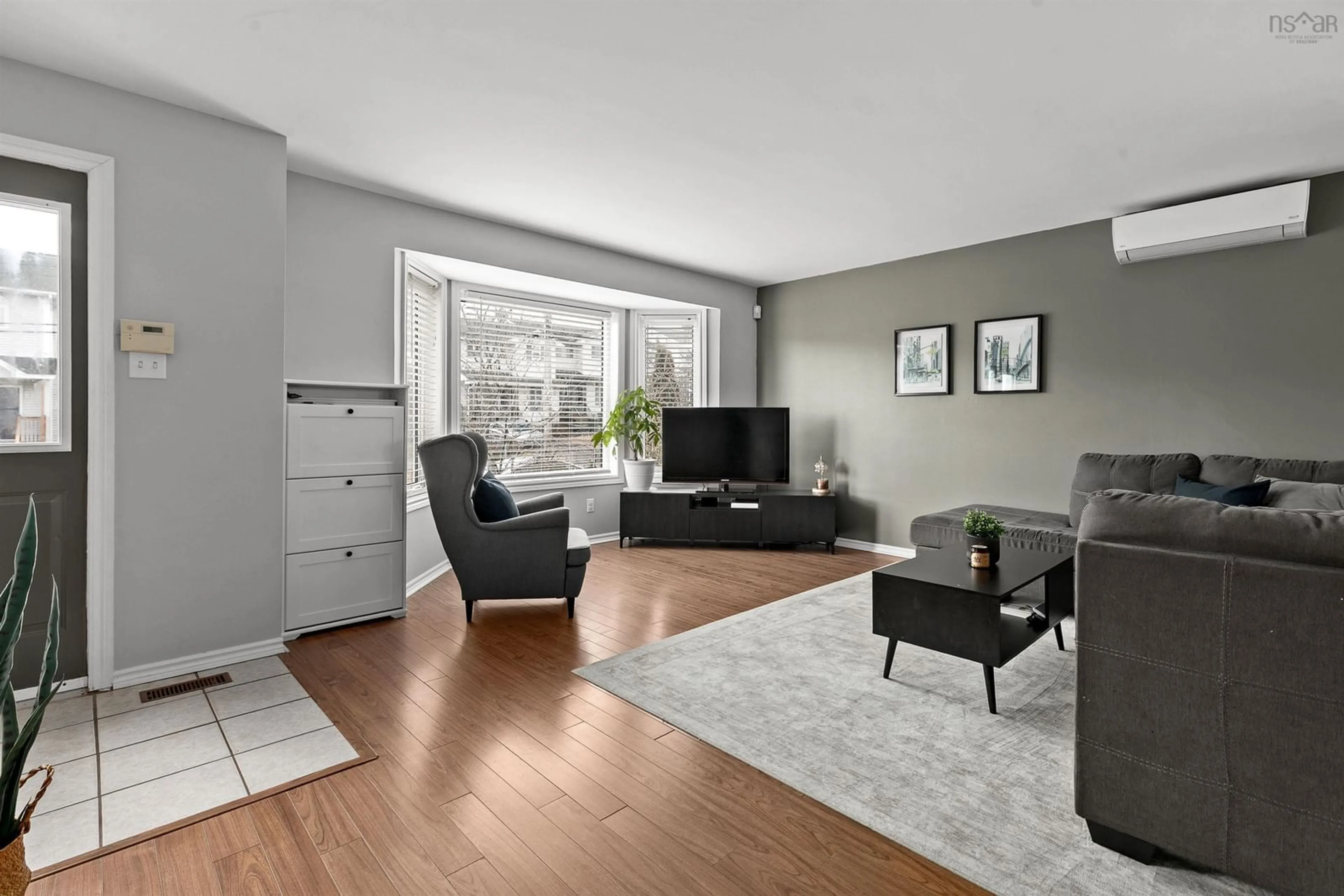 Living room with furniture, wood/laminate floor for 60 Serocco Cres, Westphal Nova Scotia B2W 6G5