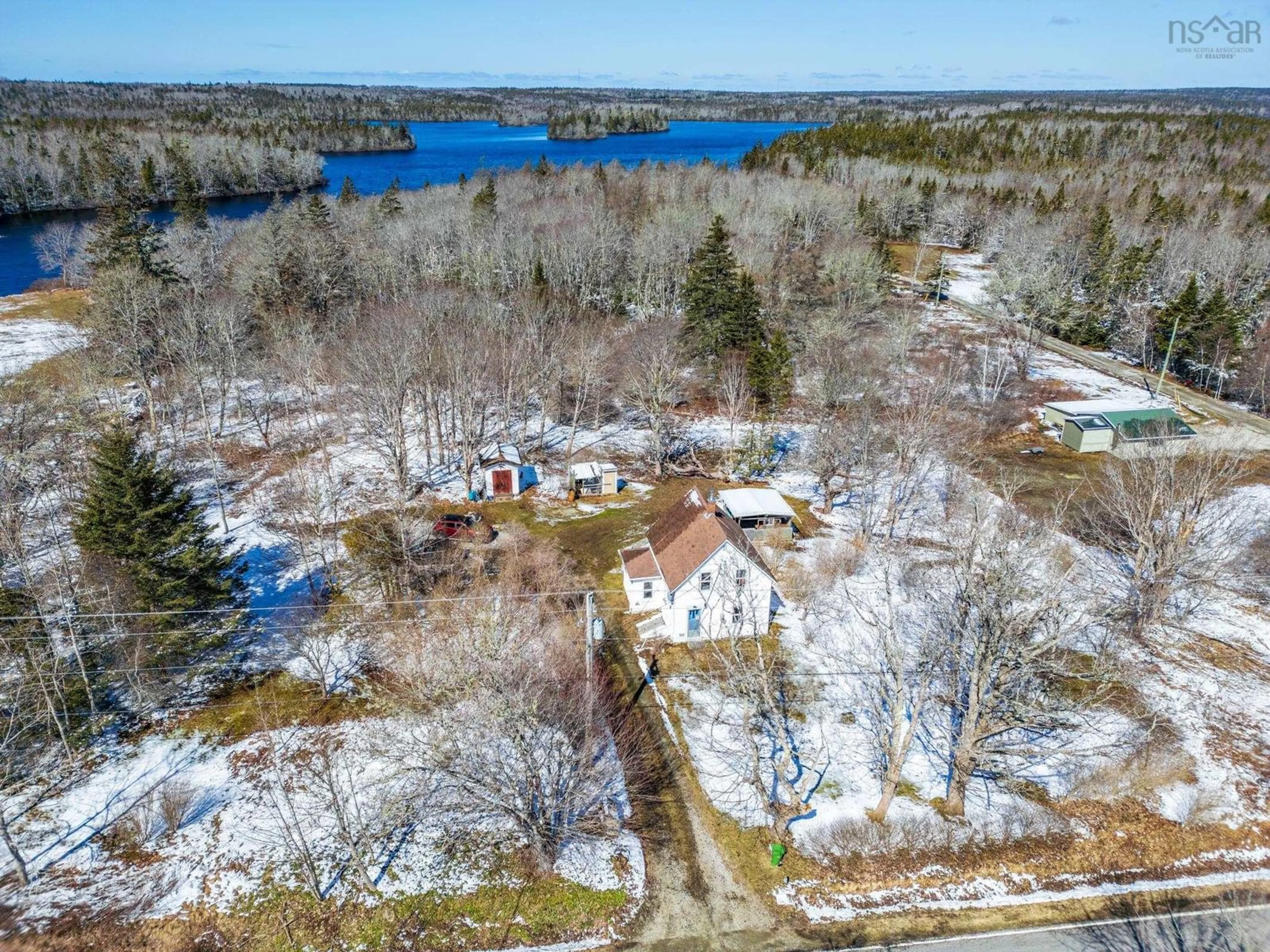 A pic from outside/outdoor area/front of a property/back of a property/a pic from drone, water/lake/river/ocean view for 9330 Highway 3, Pleasant Lake Nova Scotia B5A 5J9