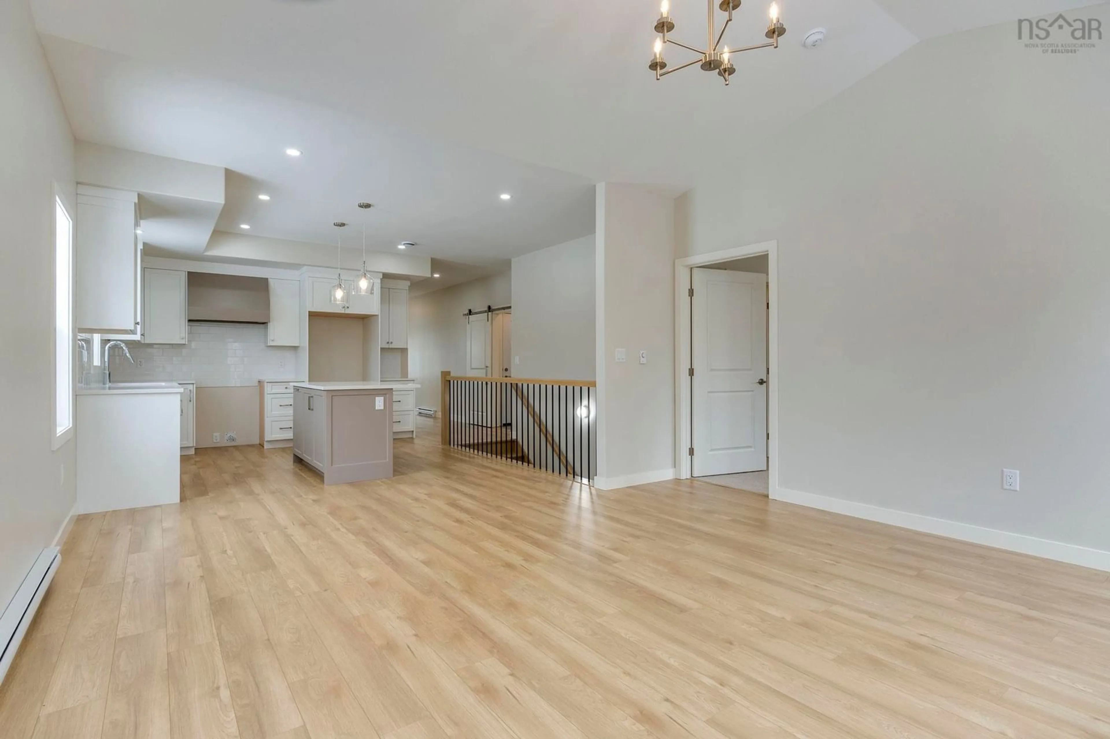 Open concept kitchen, wood/laminate floor for 48 Gardenia Way #GW-8, Dartmouth Nova Scotia B2X 0C8