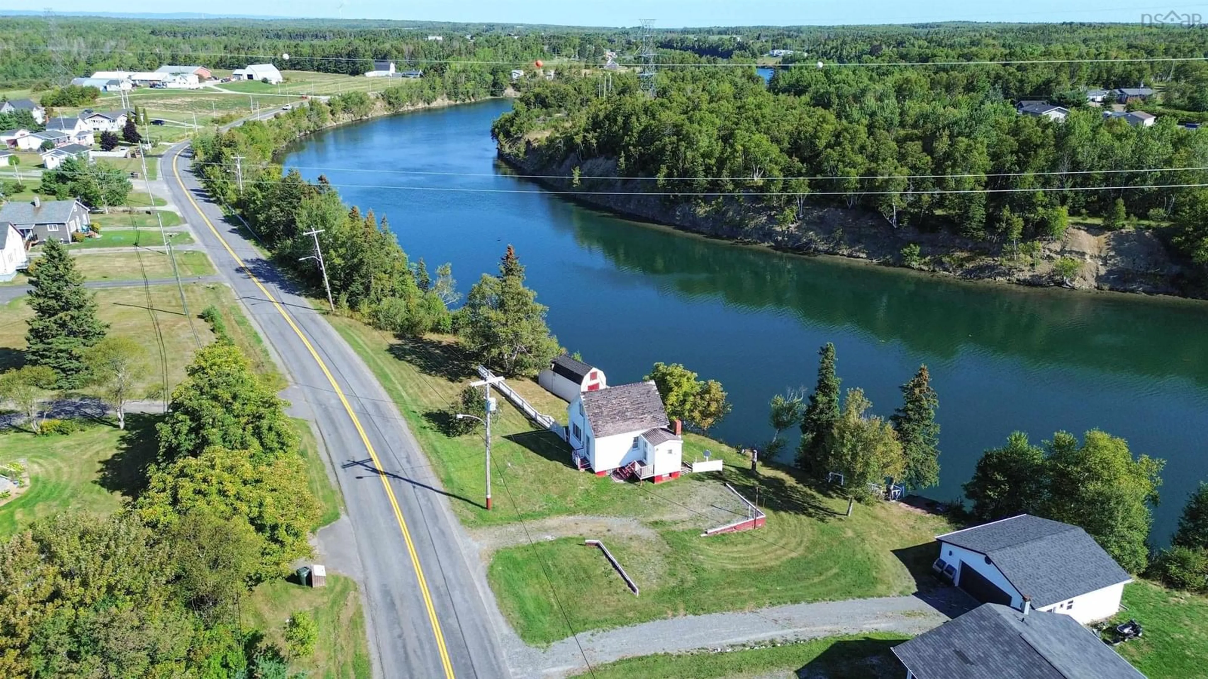 A pic from outside/outdoor area/front of a property/back of a property/a pic from drone, water/lake/river/ocean view for 48 Point Aconi Rd, Point Aconi Nova Scotia B1Y 2M8