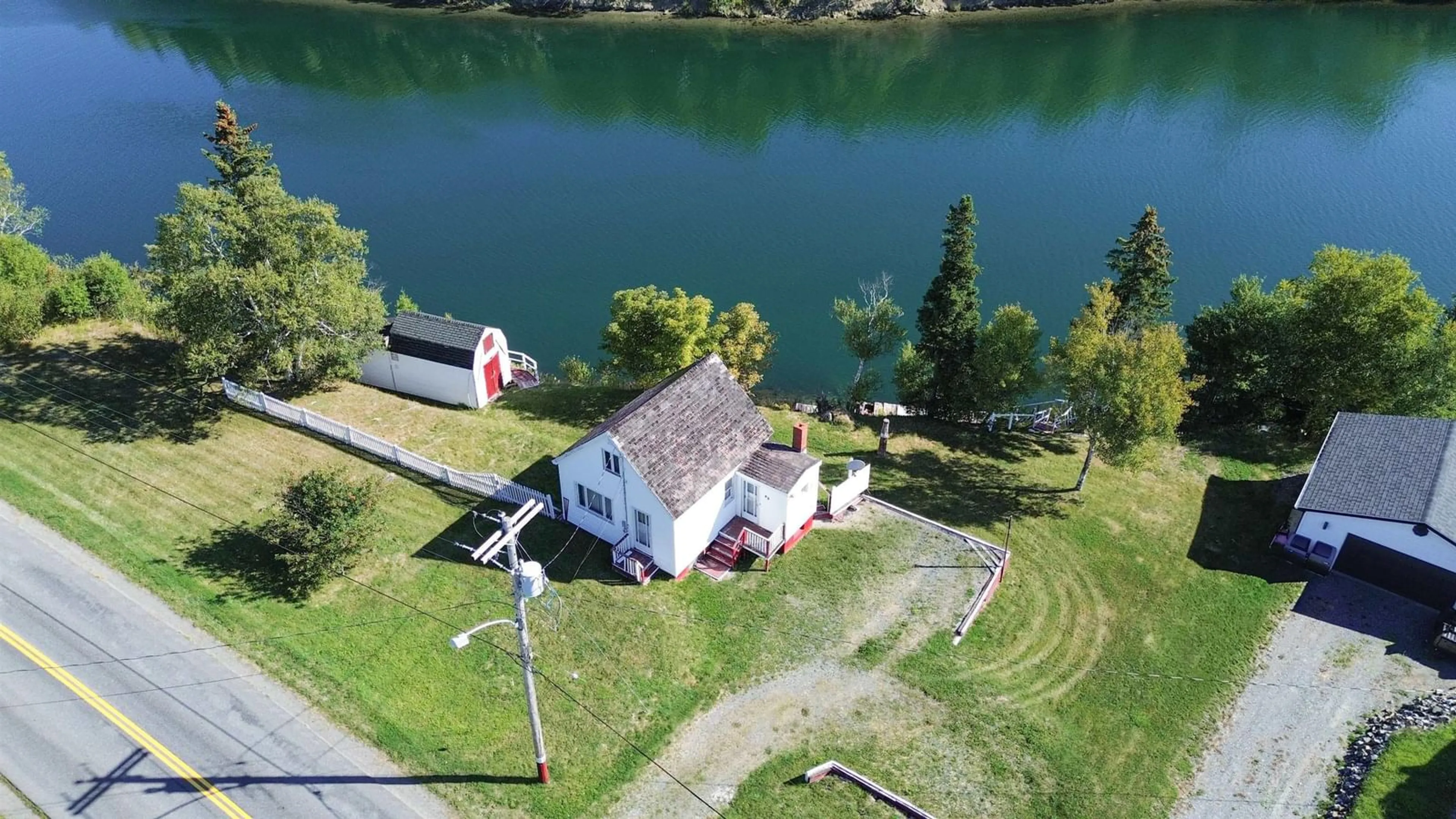 A pic from outside/outdoor area/front of a property/back of a property/a pic from drone, water/lake/river/ocean view for 48 Point Aconi Rd, Point Aconi Nova Scotia B1Y 2M8