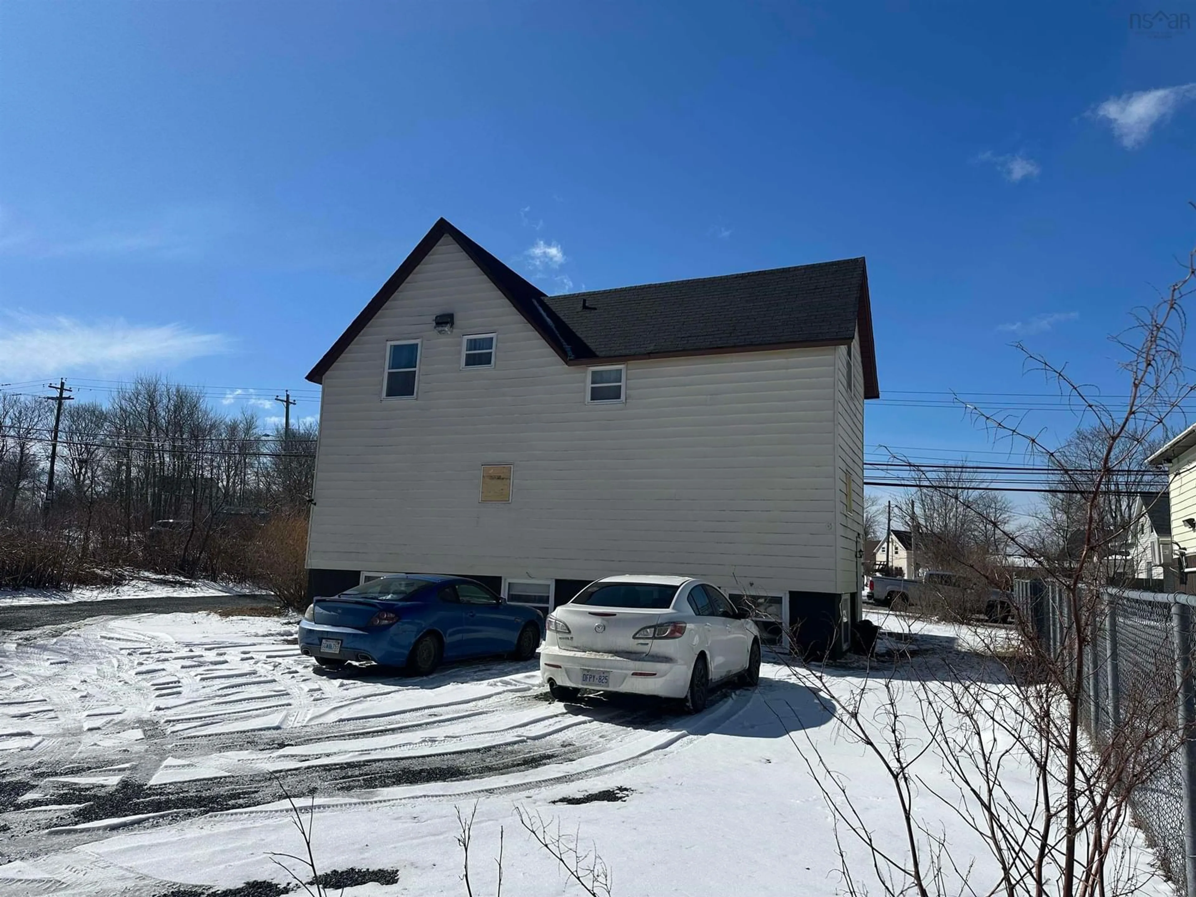 A pic from outside/outdoor area/front of a property/back of a property/a pic from drone, building for 1326 Main St, Glace Bay Nova Scotia B1A 5A7