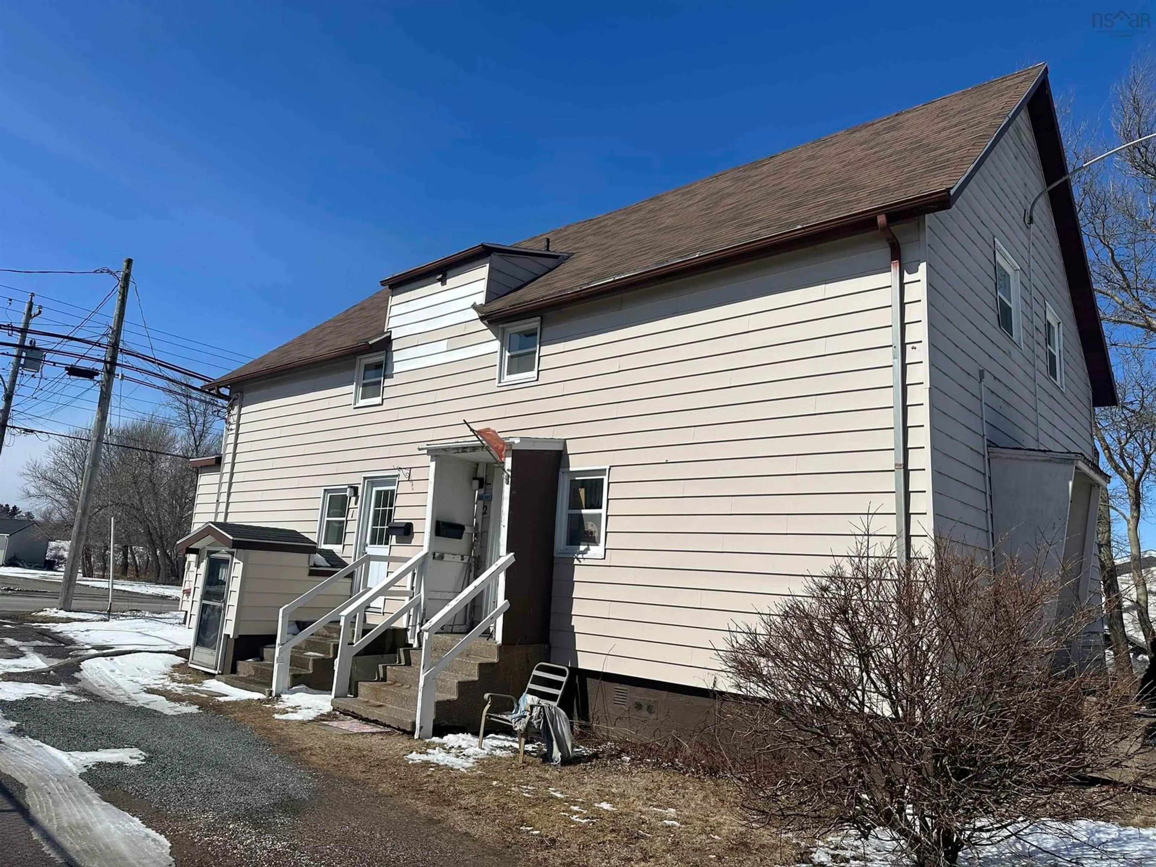 Home with vinyl exterior material, street for 1334 Main St, Glace Bay Nova Scotia B1A 5A7