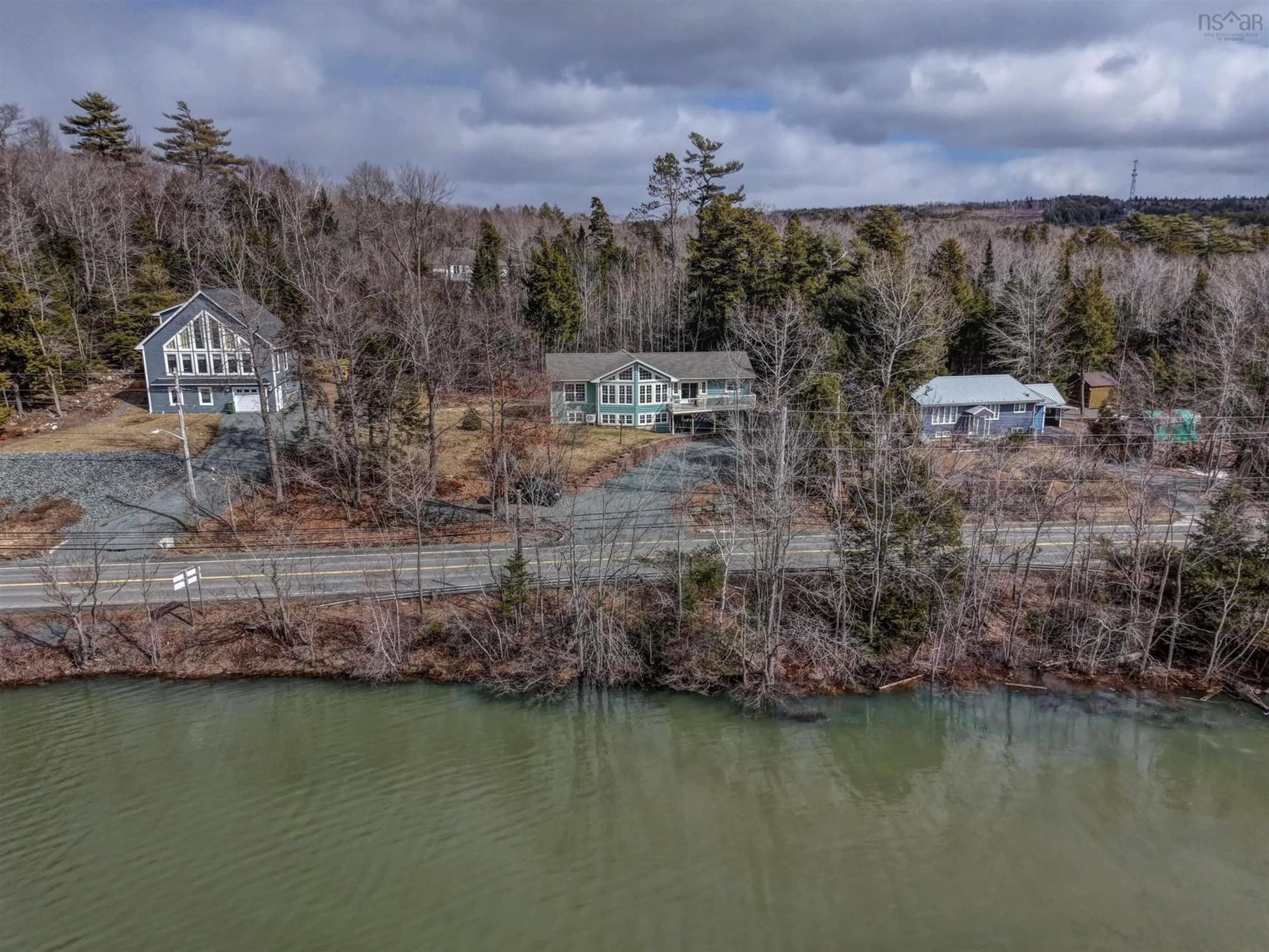 A pic from outside/outdoor area/front of a property/back of a property/a pic from drone, water/lake/river/ocean view for 4038 Highway 2, Fletchers Lake Nova Scotia B2T 1A3