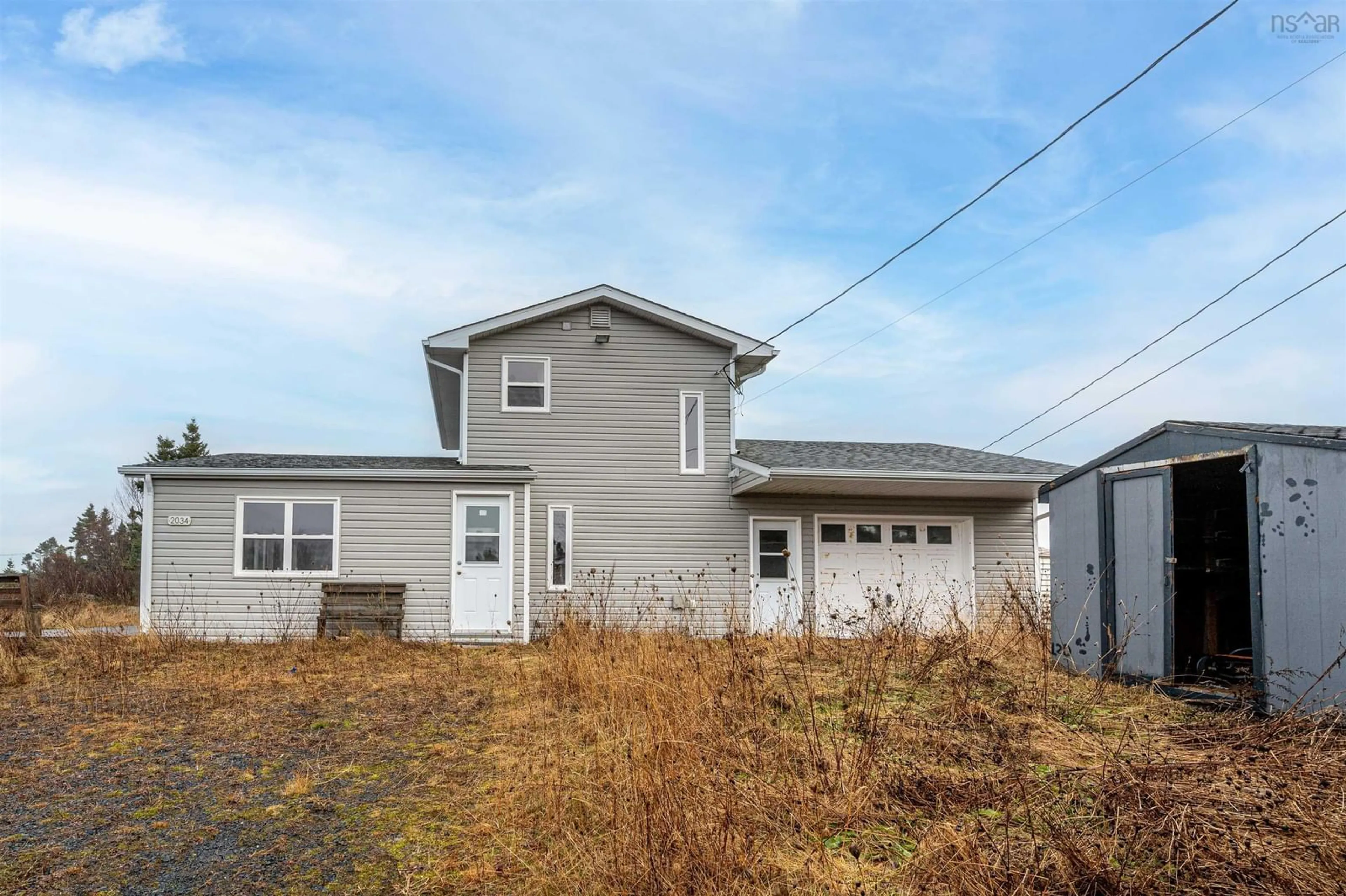 Home with vinyl exterior material, street for 2034 Lower Prospect Road, Lower Prospect Nova Scotia B3T 1Y8