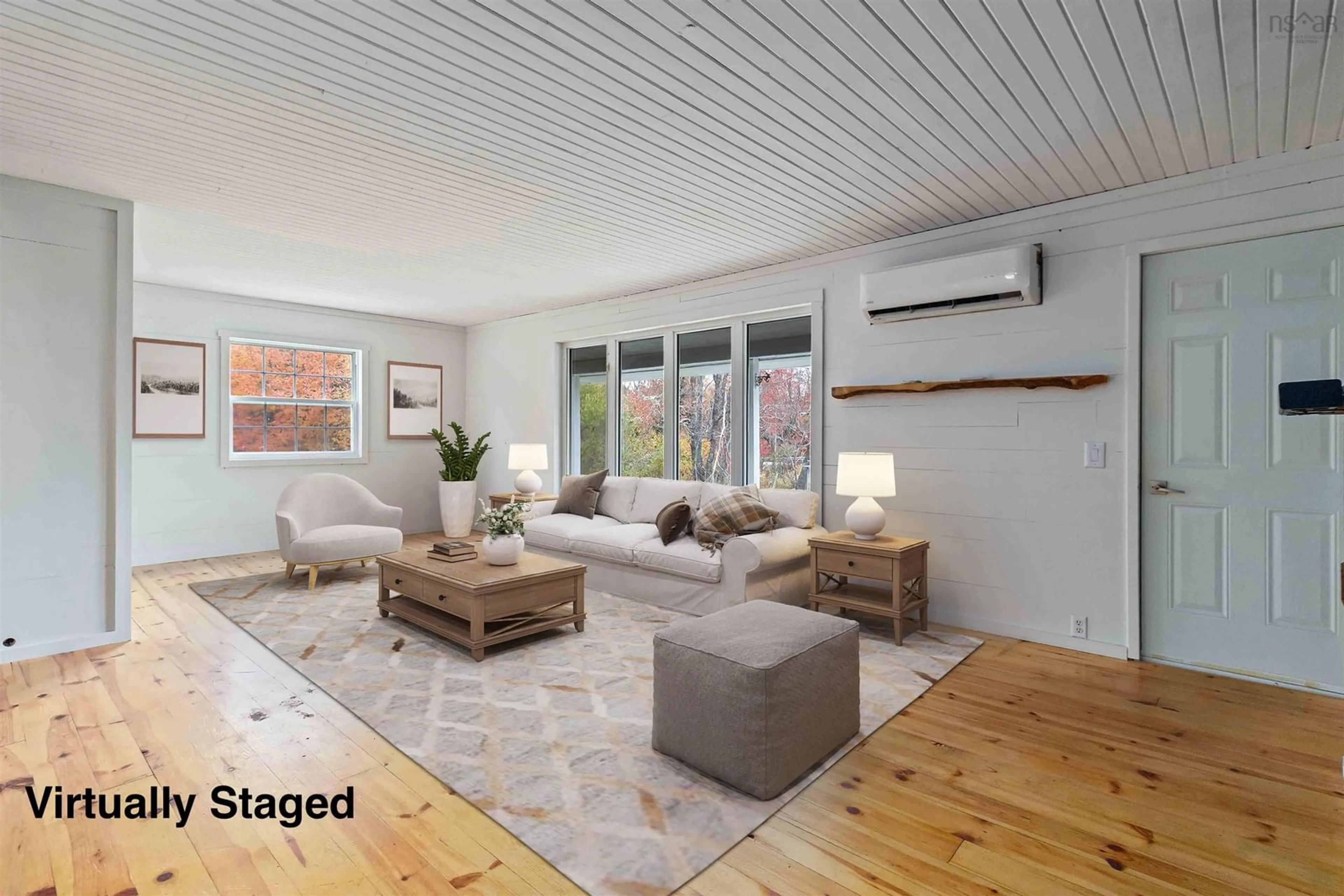 Living room with furniture, wood/laminate floor for 10302 Highway 3, Port Joli Nova Scotia B0T 1S0