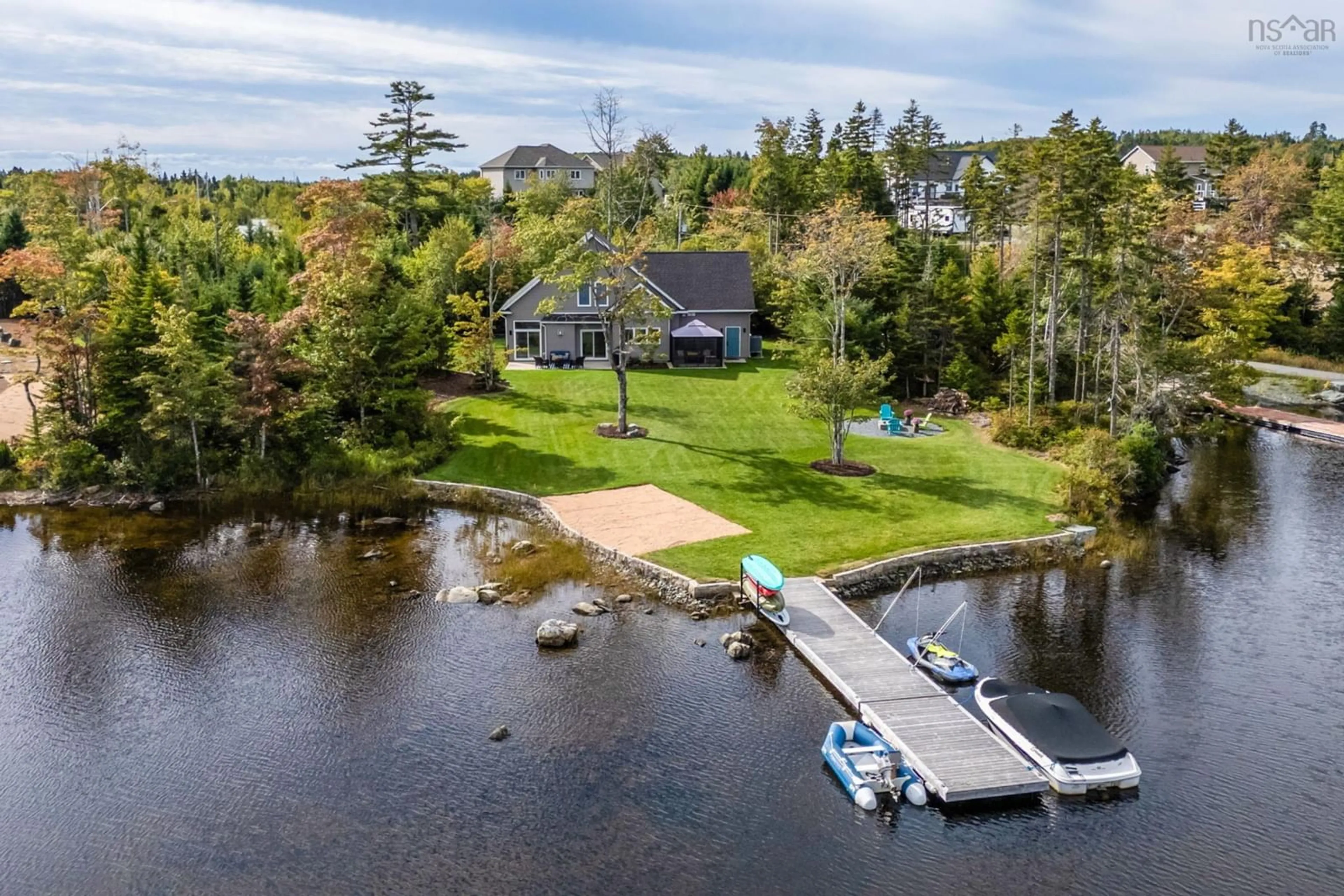A pic from outside/outdoor area/front of a property/back of a property/a pic from drone, water/lake/river/ocean view for 3 Fiddlehead Way, Porters Lake Nova Scotia B3E 1P4