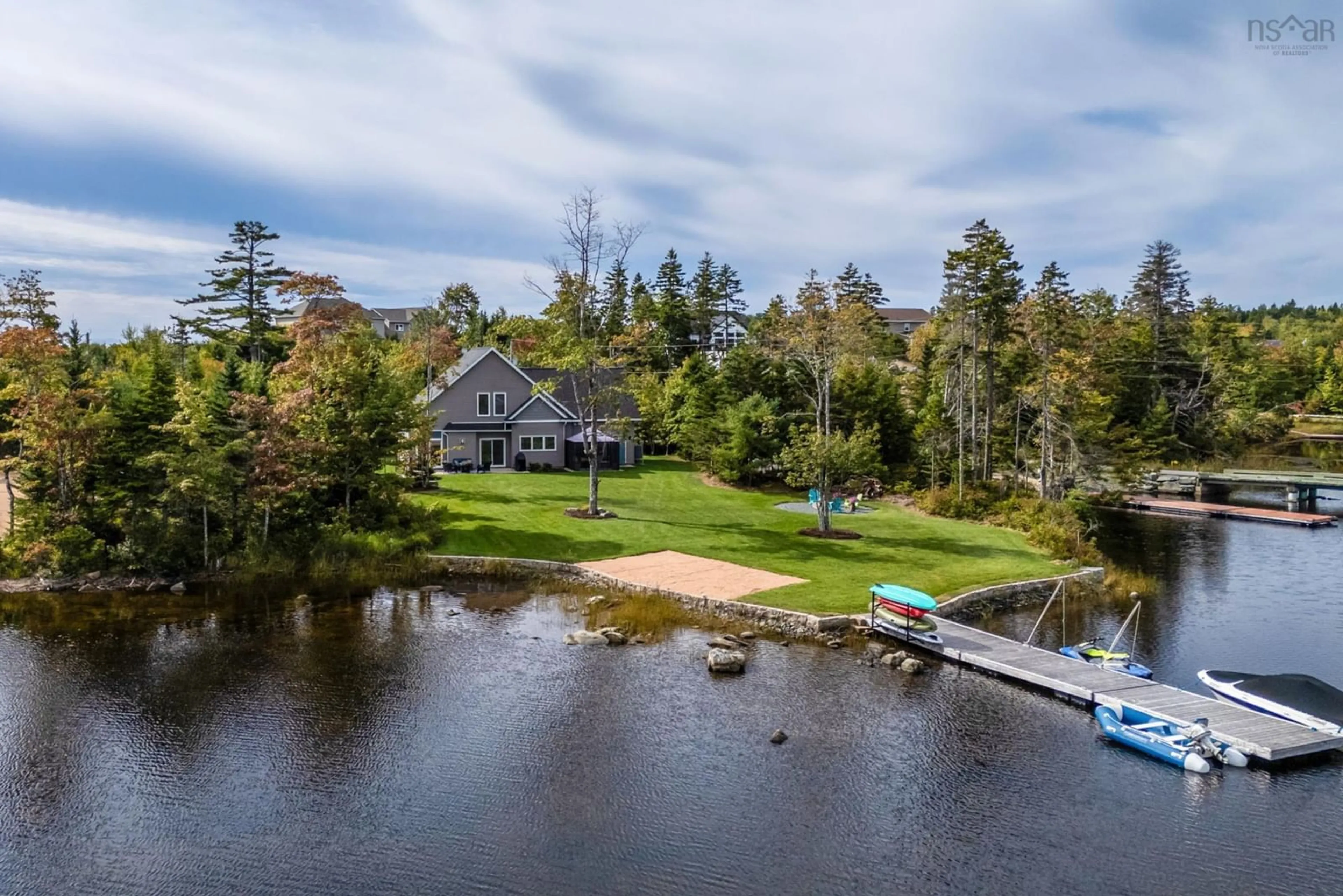A pic from outside/outdoor area/front of a property/back of a property/a pic from drone, water/lake/river/ocean view for 3 Fiddlehead Way, Porters Lake Nova Scotia B3E 1P4