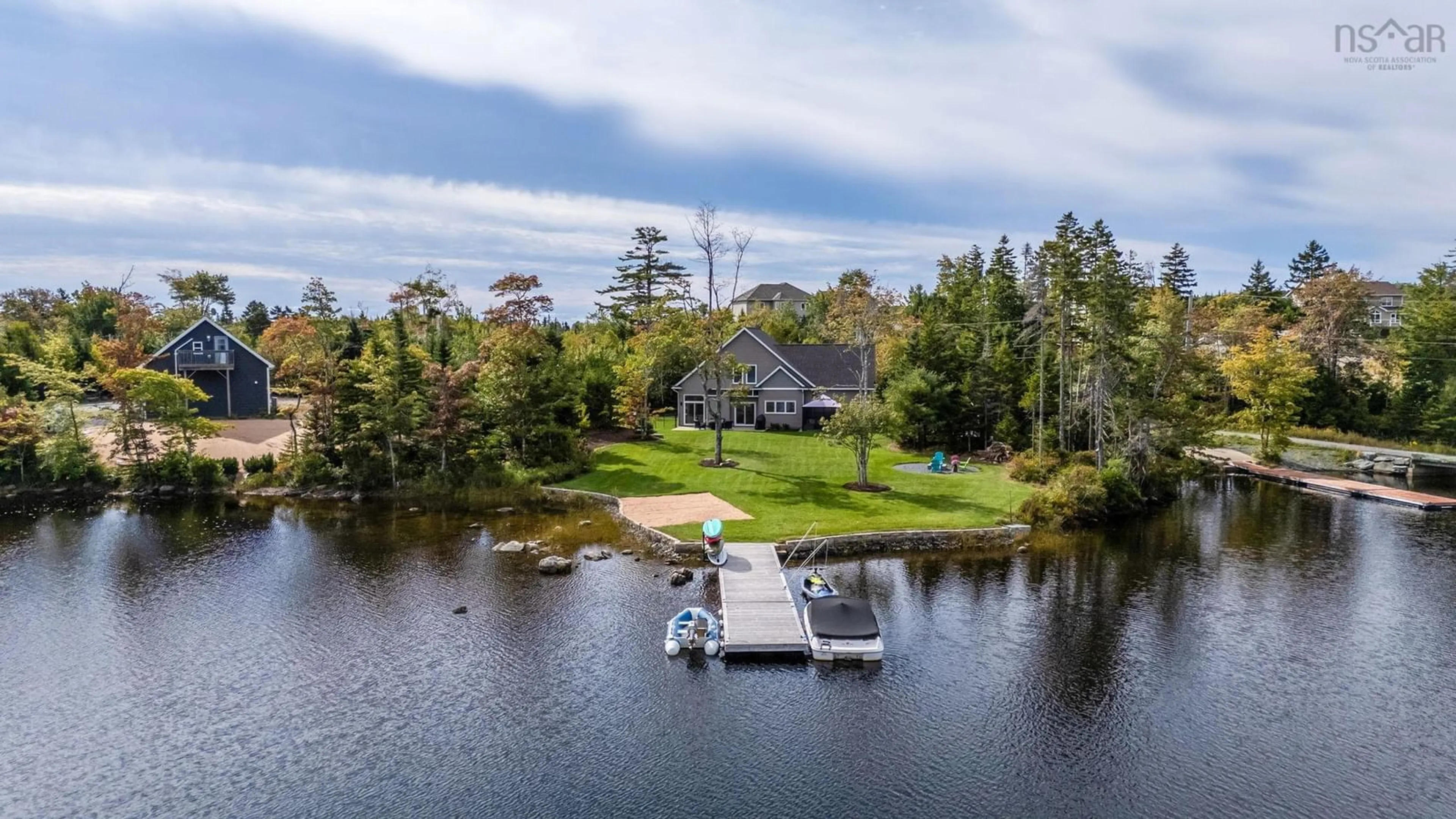 A pic from outside/outdoor area/front of a property/back of a property/a pic from drone, water/lake/river/ocean view for 3 Fiddlehead Way, Porters Lake Nova Scotia B3E 1P4