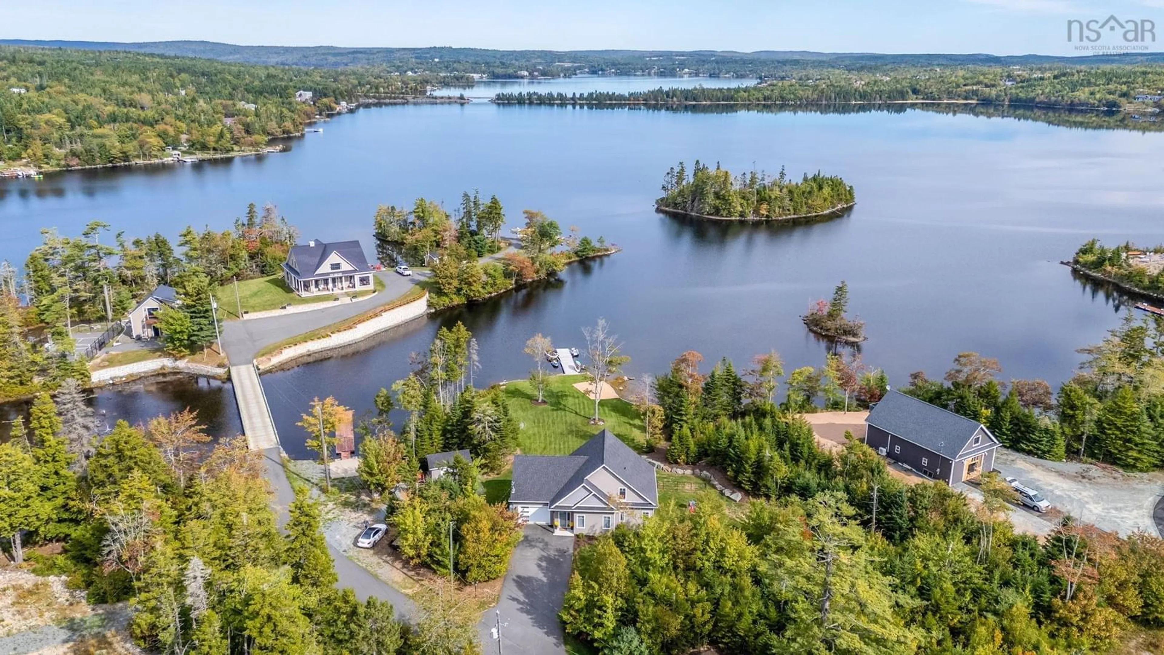 A pic from outside/outdoor area/front of a property/back of a property/a pic from drone, water/lake/river/ocean view for 3 Fiddlehead Way, Porters Lake Nova Scotia B3E 1P4