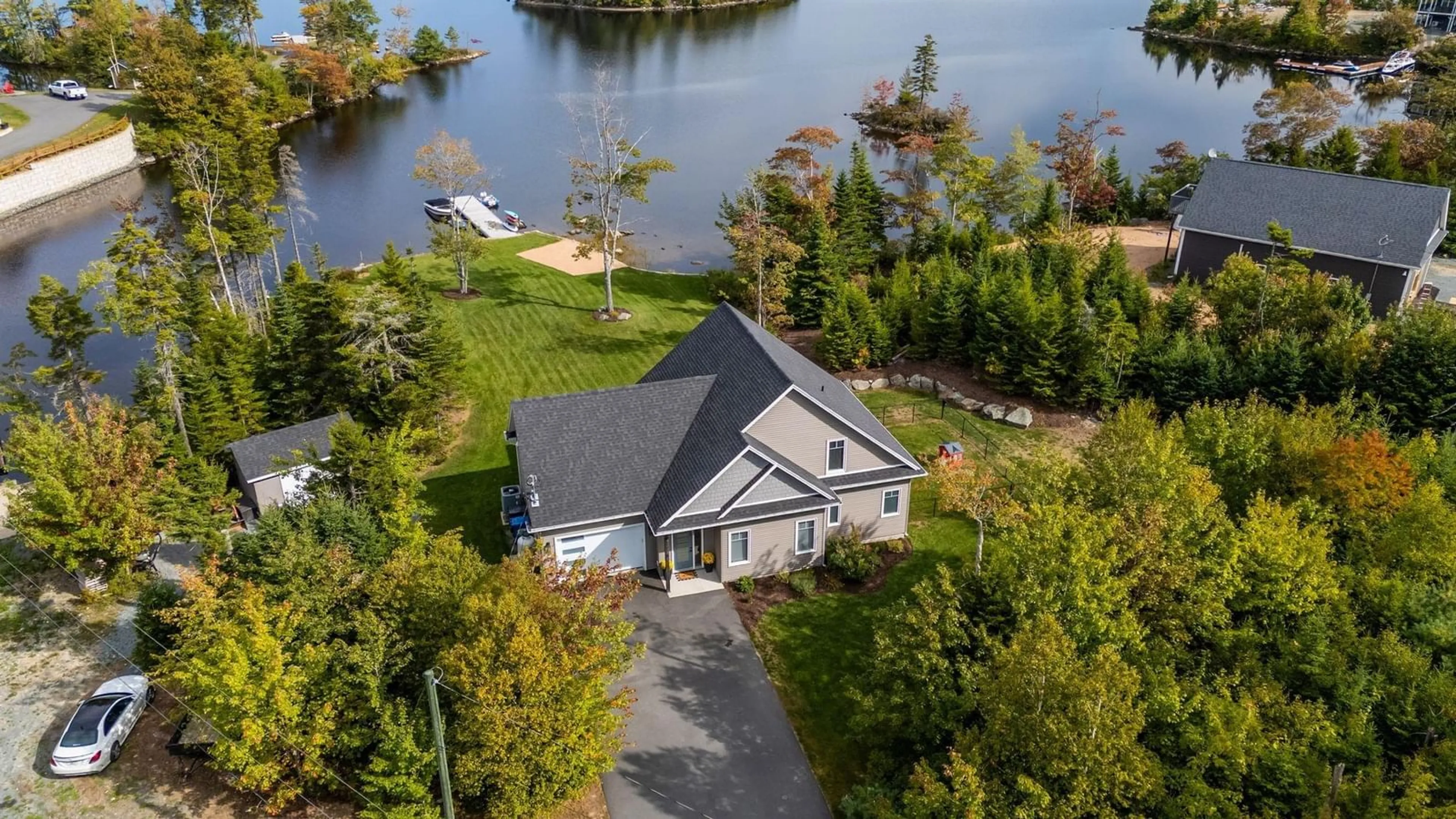A pic from outside/outdoor area/front of a property/back of a property/a pic from drone, water/lake/river/ocean view for 3 Fiddlehead Way, Porters Lake Nova Scotia B3E 1P4