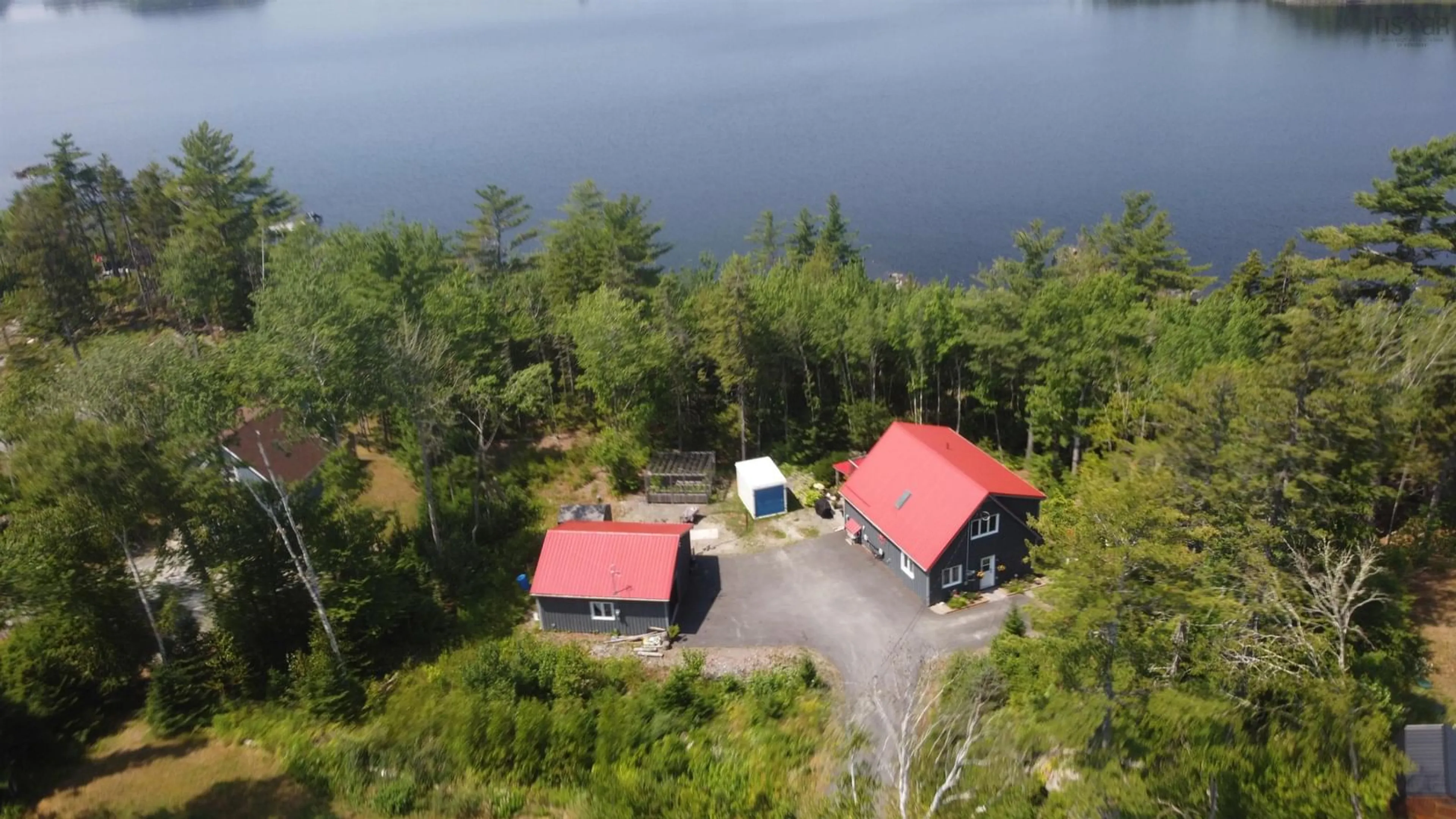 A pic from outside/outdoor area/front of a property/back of a property/a pic from drone, water/lake/river/ocean view for 62 Western Point Lane, East Uniacke Nova Scotia B0N 1Z0