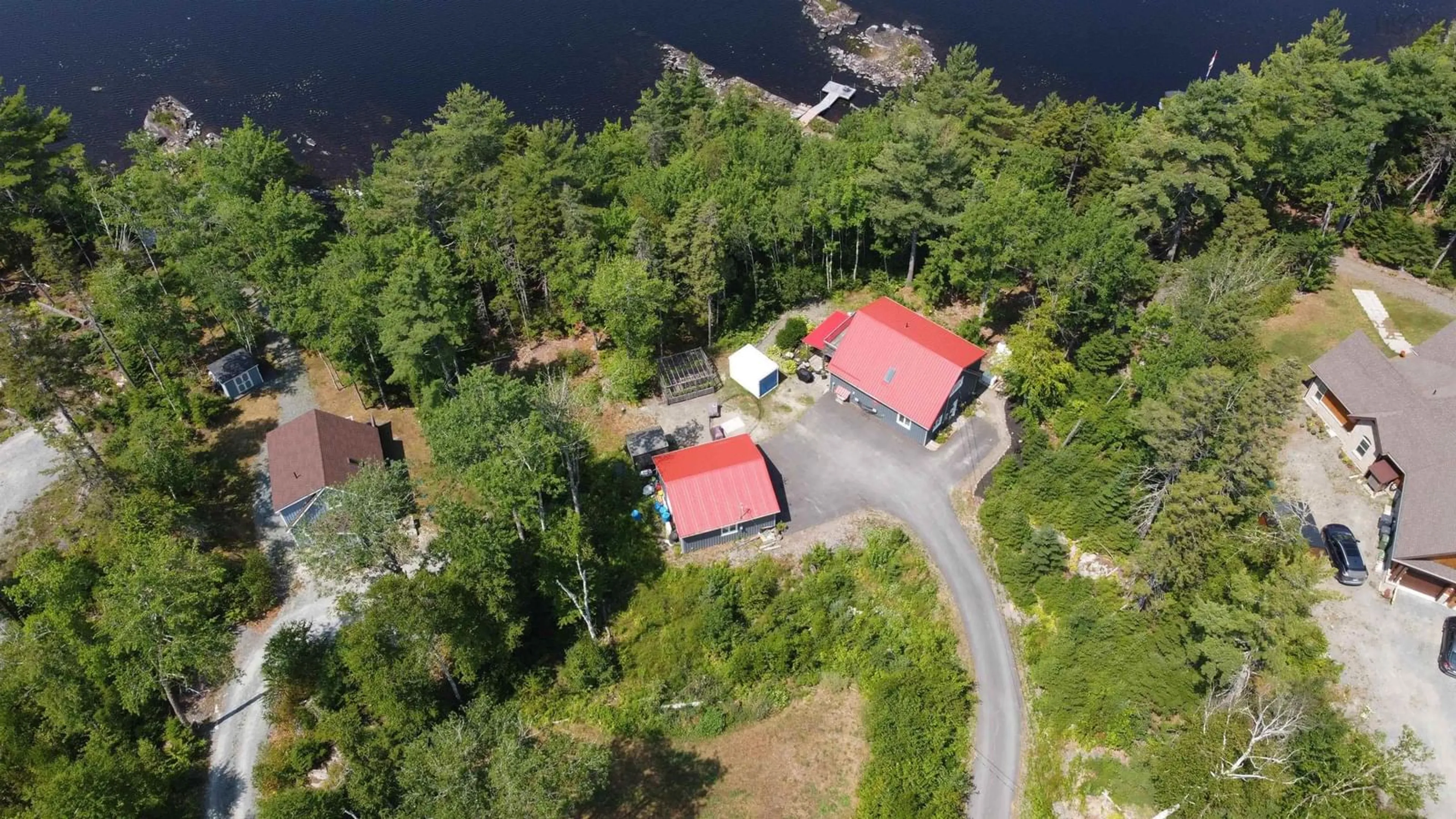 A pic from outside/outdoor area/front of a property/back of a property/a pic from drone, water/lake/river/ocean view for 62 Western Point Lane, East Uniacke Nova Scotia B0N 1Z0