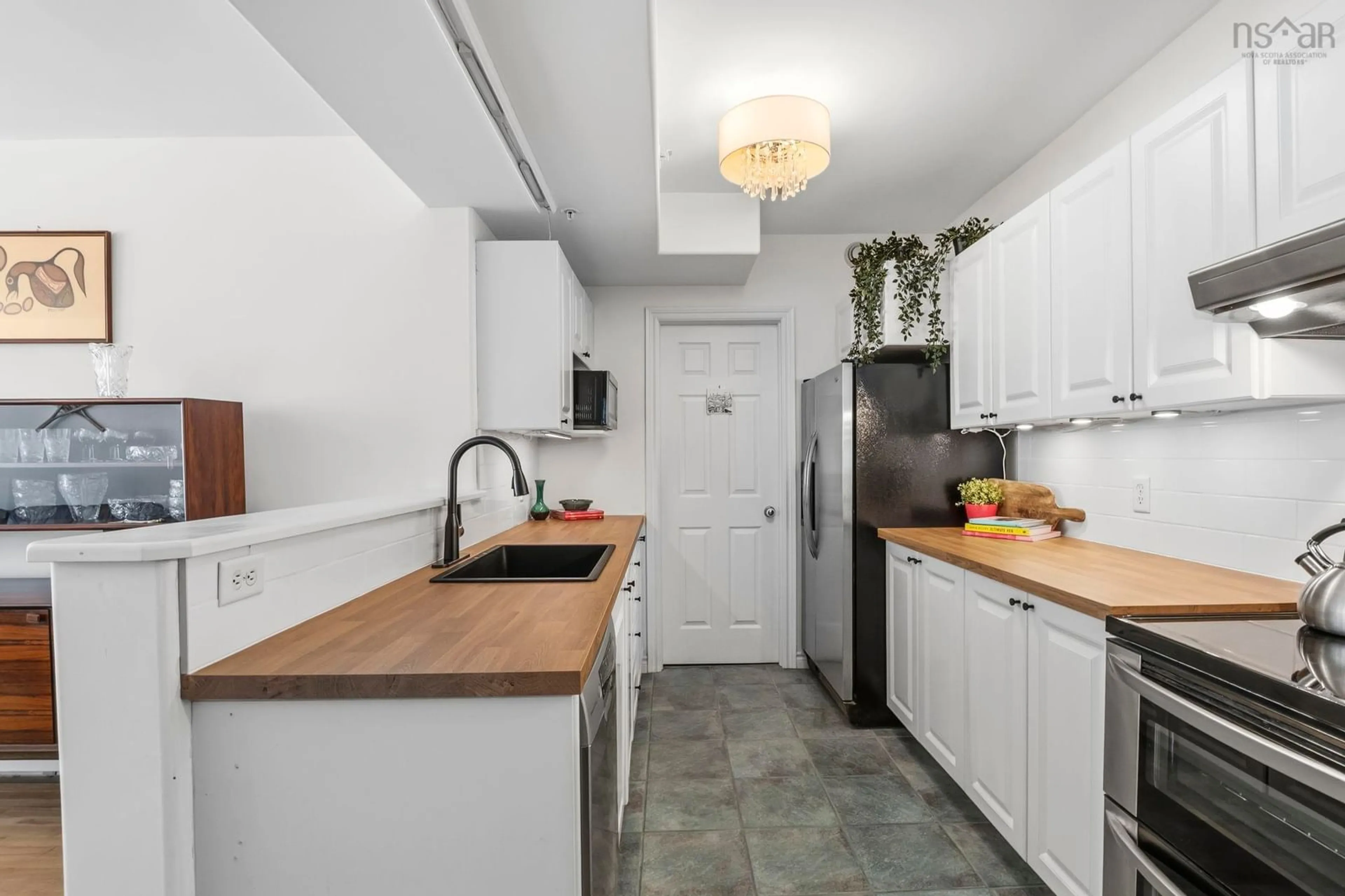 Standard kitchen, ceramic/tile floor for 99 Waterfront Dr #106, Bedford Nova Scotia B4A 4K5