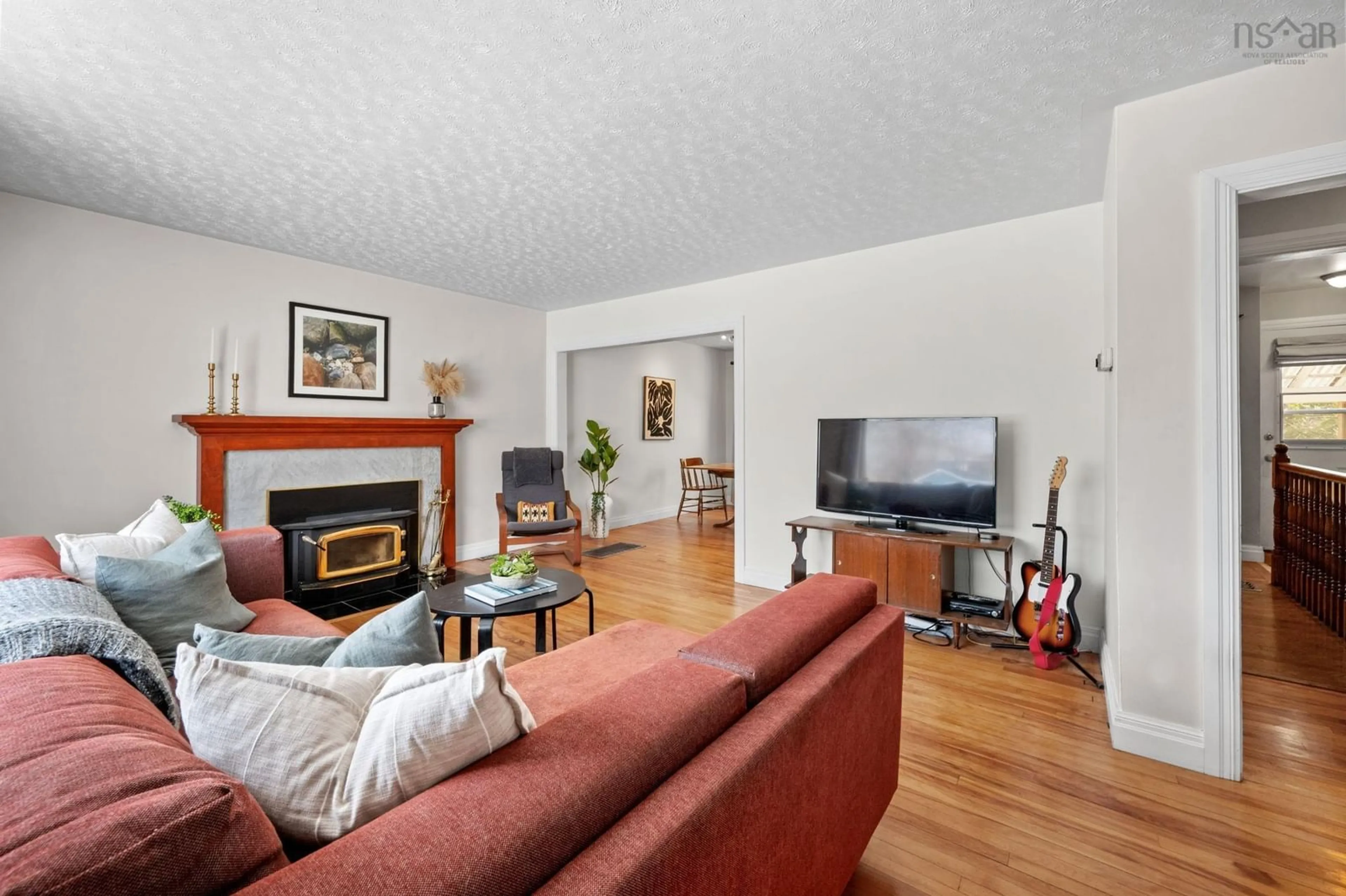 Living room with furniture, wood/laminate floor for 197 Pleasant St, Truro Nova Scotia B2N 3S7
