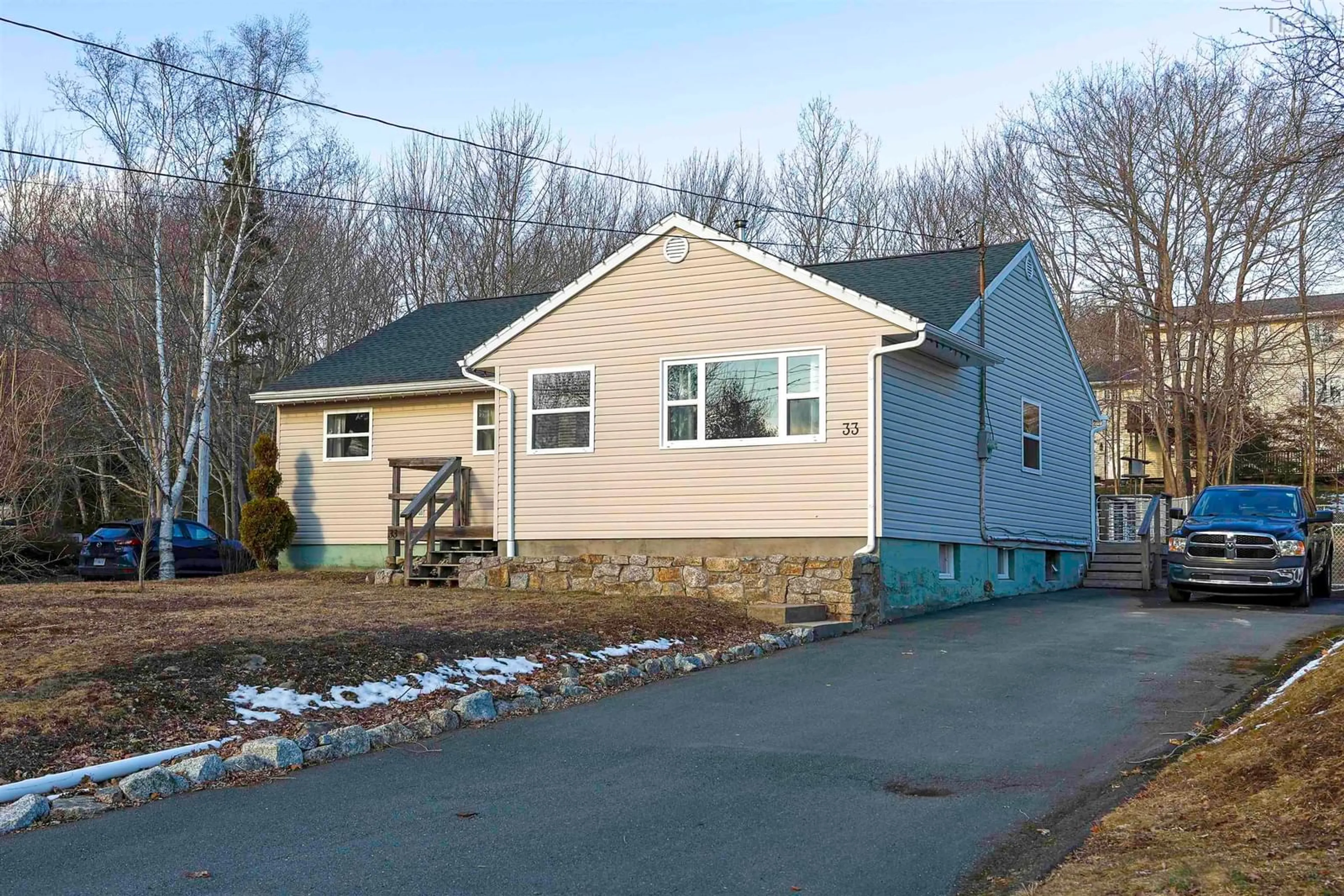 Home with vinyl exterior material, street for 33 Micmac Dr, Dartmouth Nova Scotia B2X 2H4