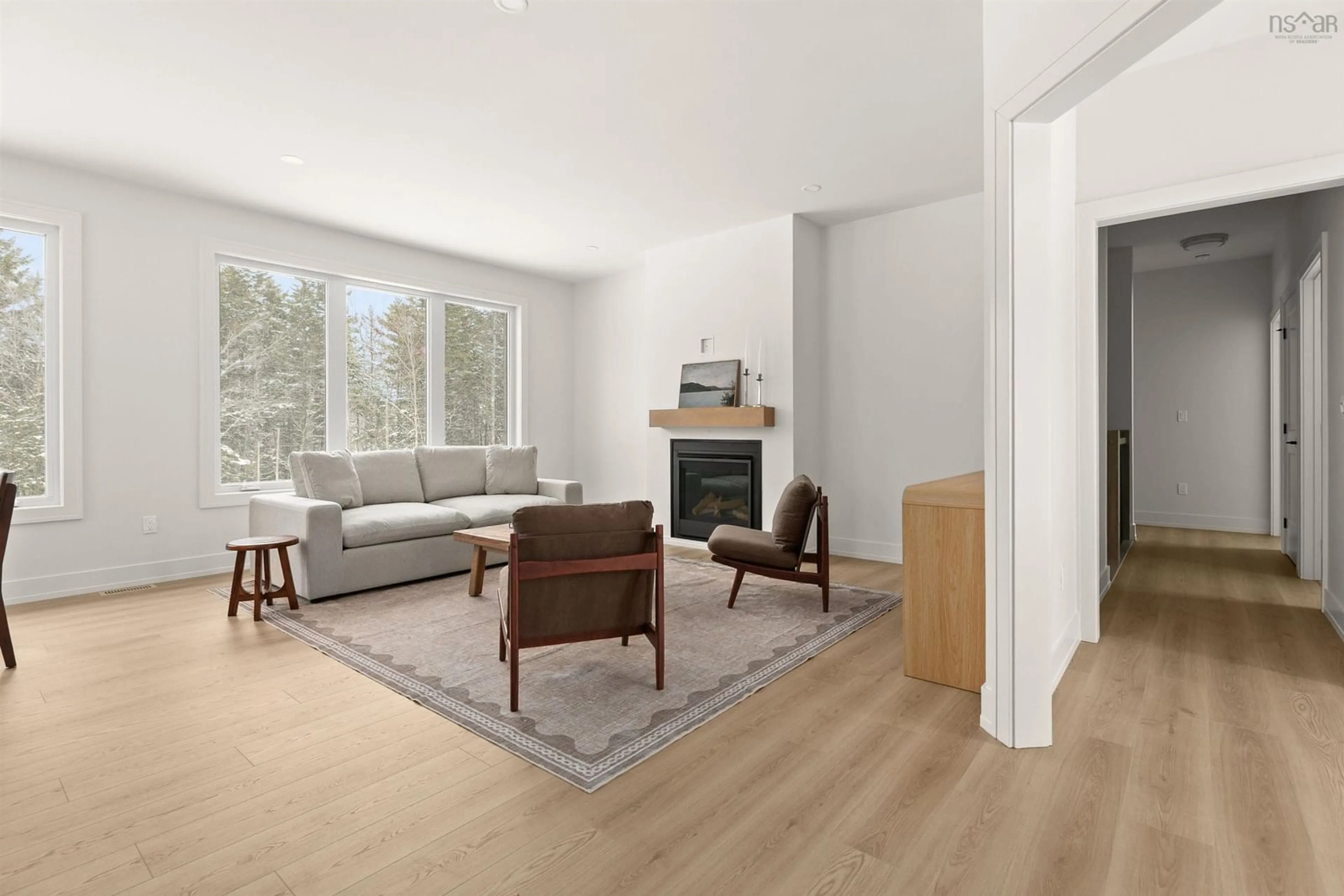 Living room with furniture, wood/laminate floor for 335 Zaffre Dr, Middle Sackville Nova Scotia B4E 0X4