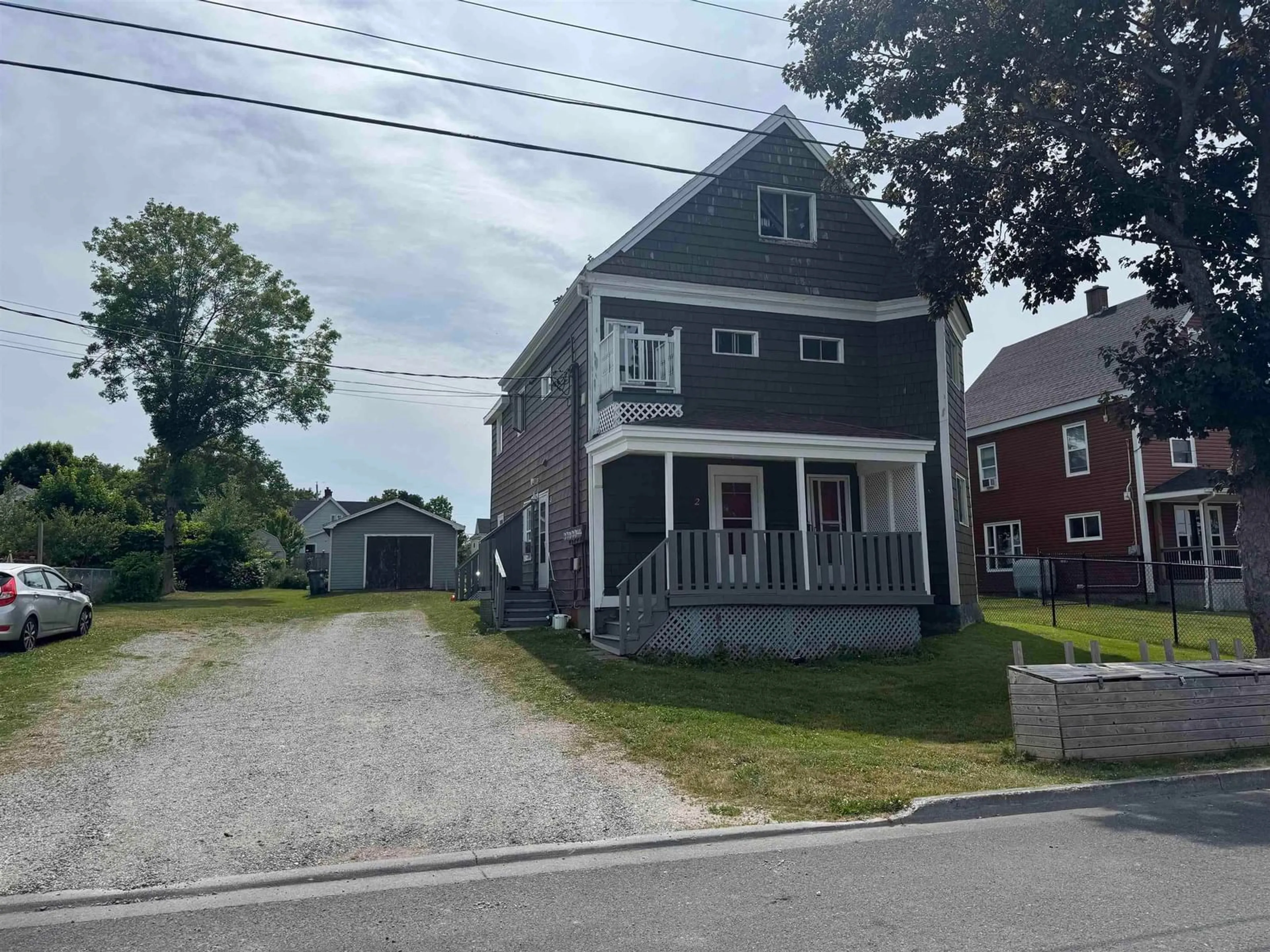 A pic from outside/outdoor area/front of a property/back of a property/a pic from drone, street for 34 Oxford Ave, Sydney Mines Nova Scotia B1V 2J2