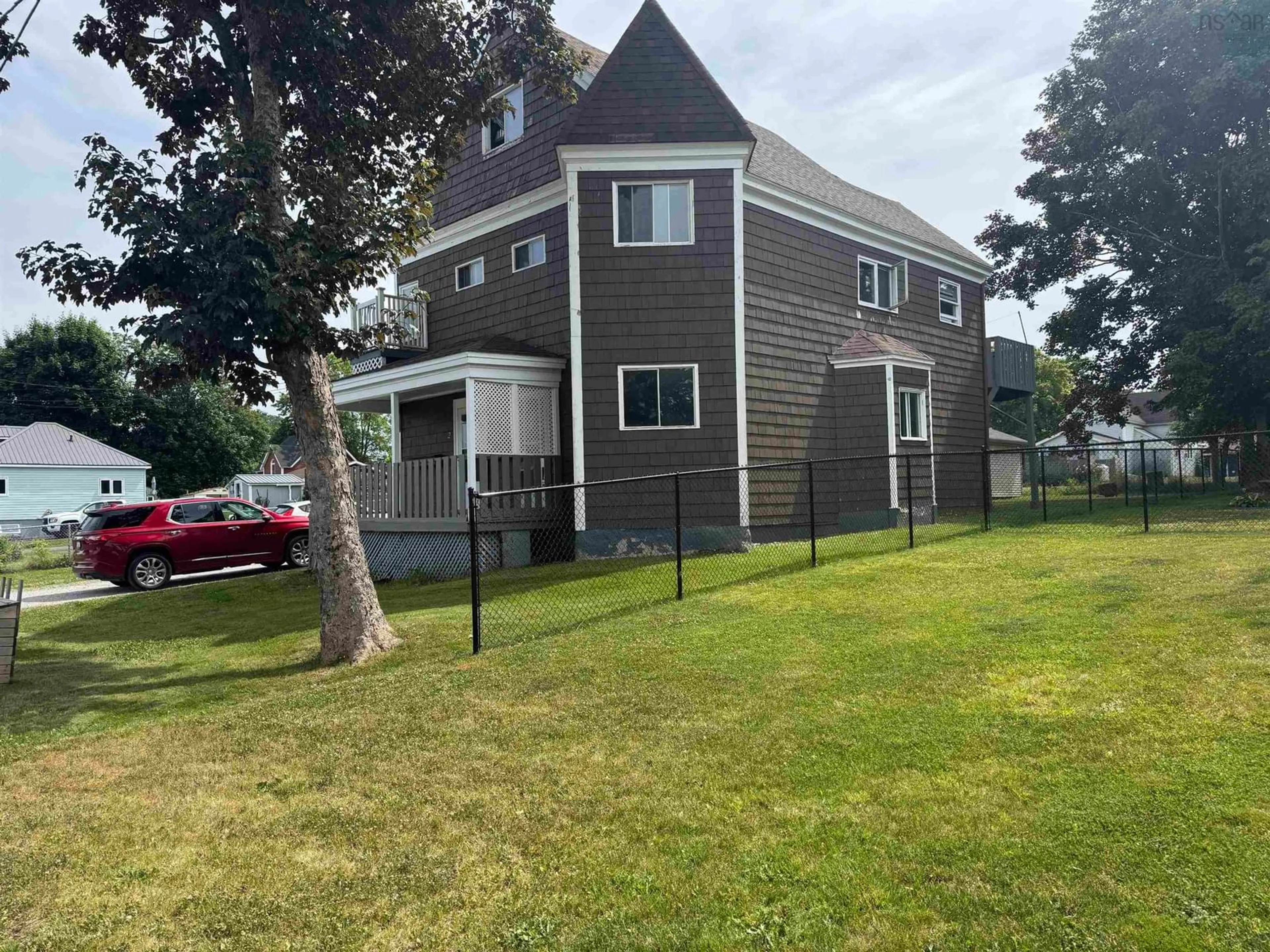 A pic from outside/outdoor area/front of a property/back of a property/a pic from drone, street for 34 Oxford Ave, Sydney Mines Nova Scotia B1V 2J2