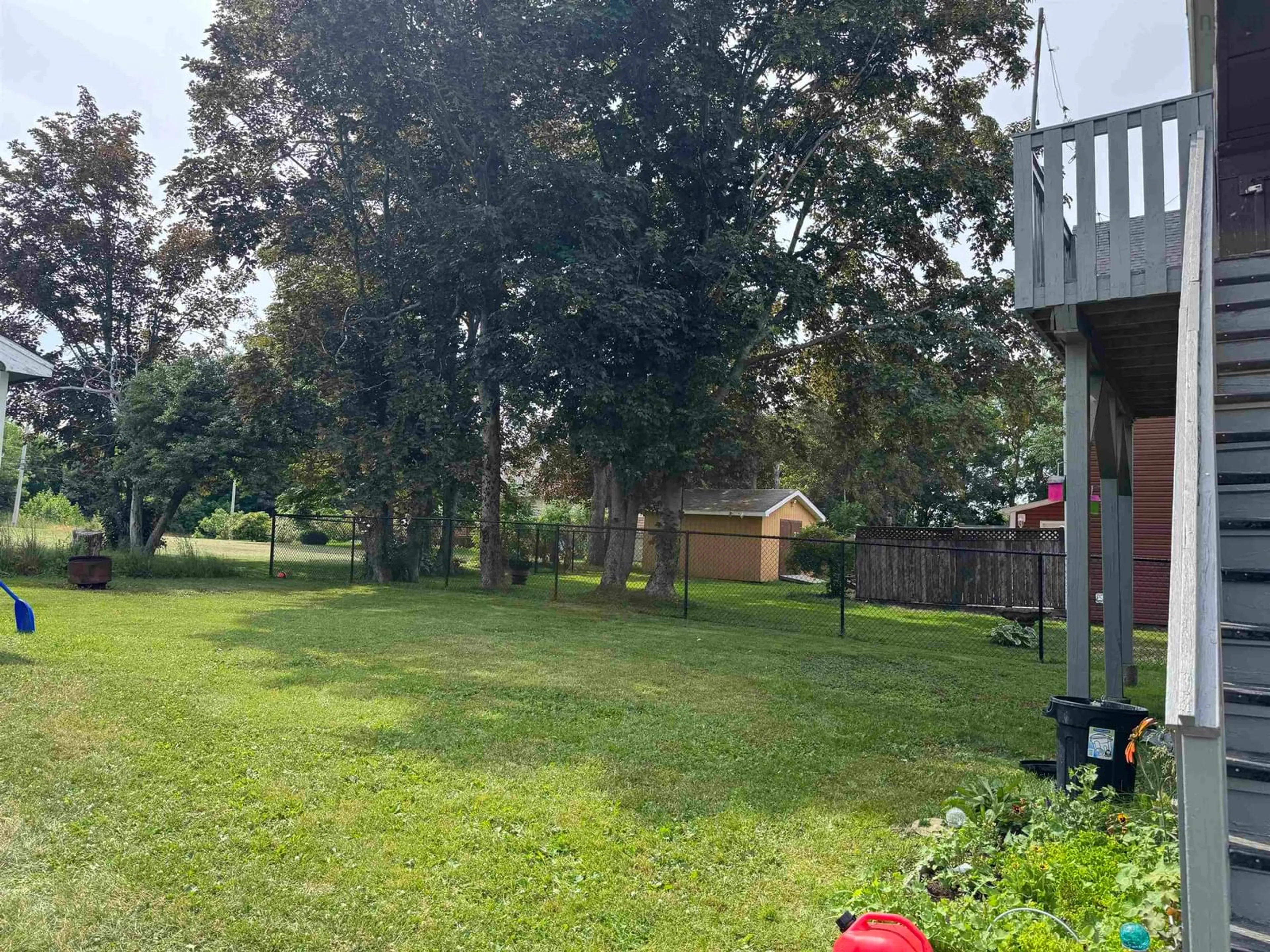 A pic from outside/outdoor area/front of a property/back of a property/a pic from drone, unknown for 34 Oxford Ave, Sydney Mines Nova Scotia B1V 2J2