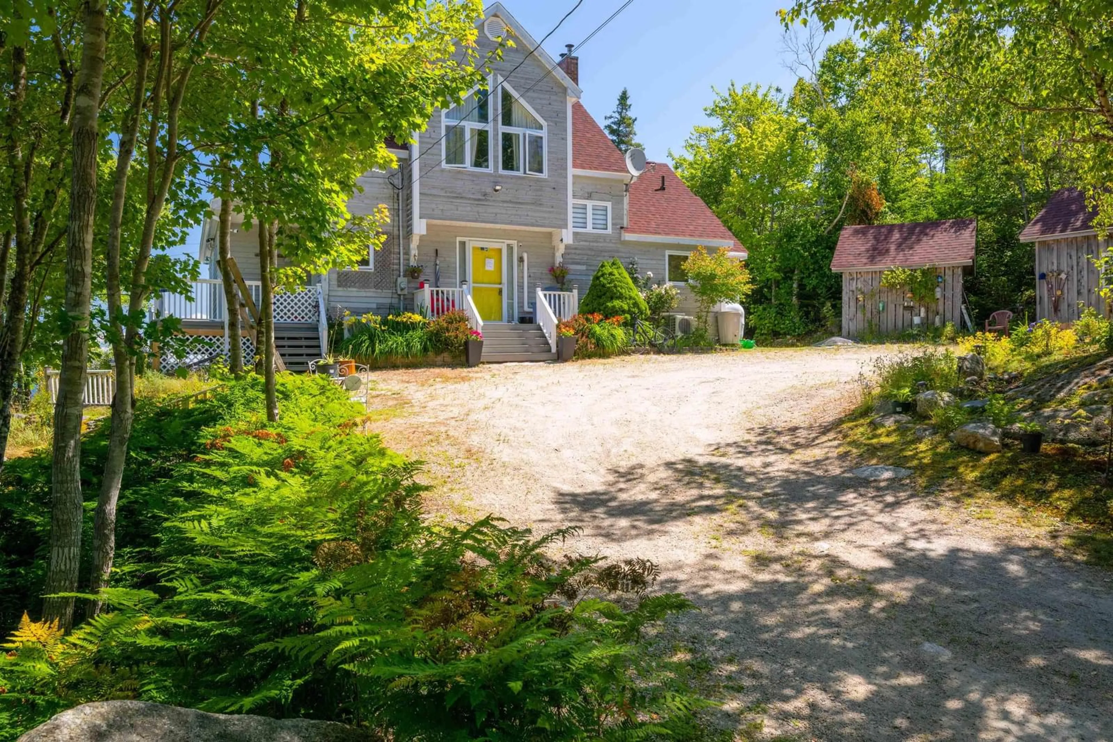 A pic from outside/outdoor area/front of a property/back of a property/a pic from drone, street for 45 Southwest Cove Rd, Northwest Cove Nova Scotia B0J 1T0