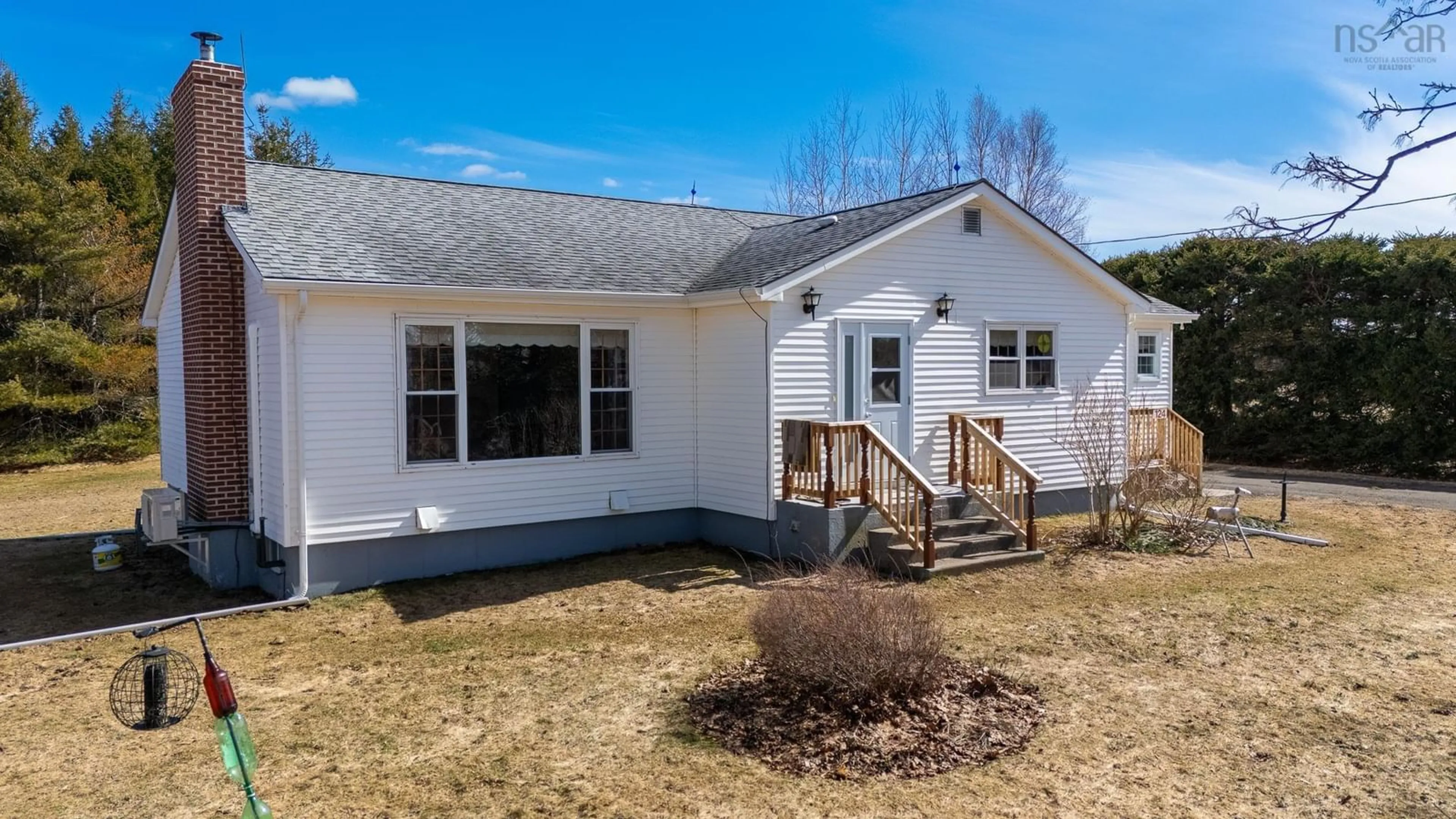 Home with vinyl exterior material, street for 124 Pomquet Monks Head Rd, Upper Pomquet Nova Scotia B2G 2L4