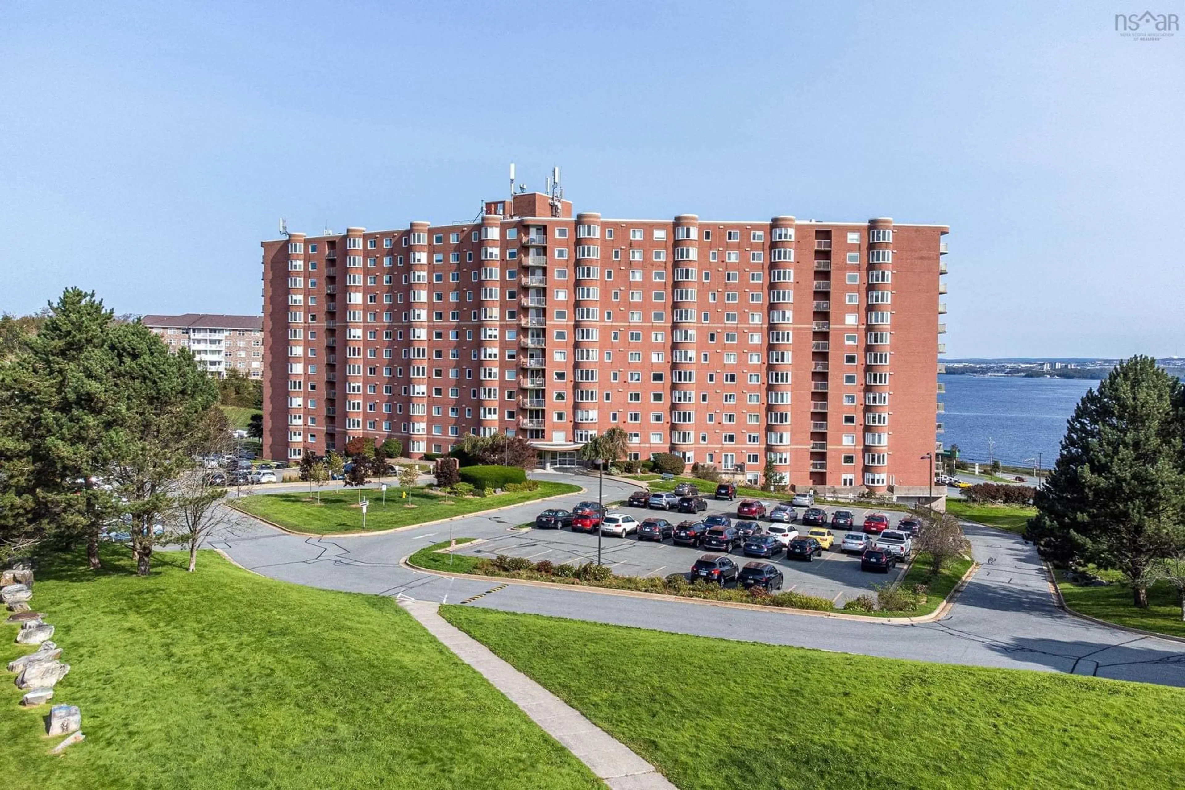 A pic from outside/outdoor area/front of a property/back of a property/a pic from drone, water/lake/river/ocean view for 45 Vimy Ave #1123, Halifax Nova Scotia B3M 4C5