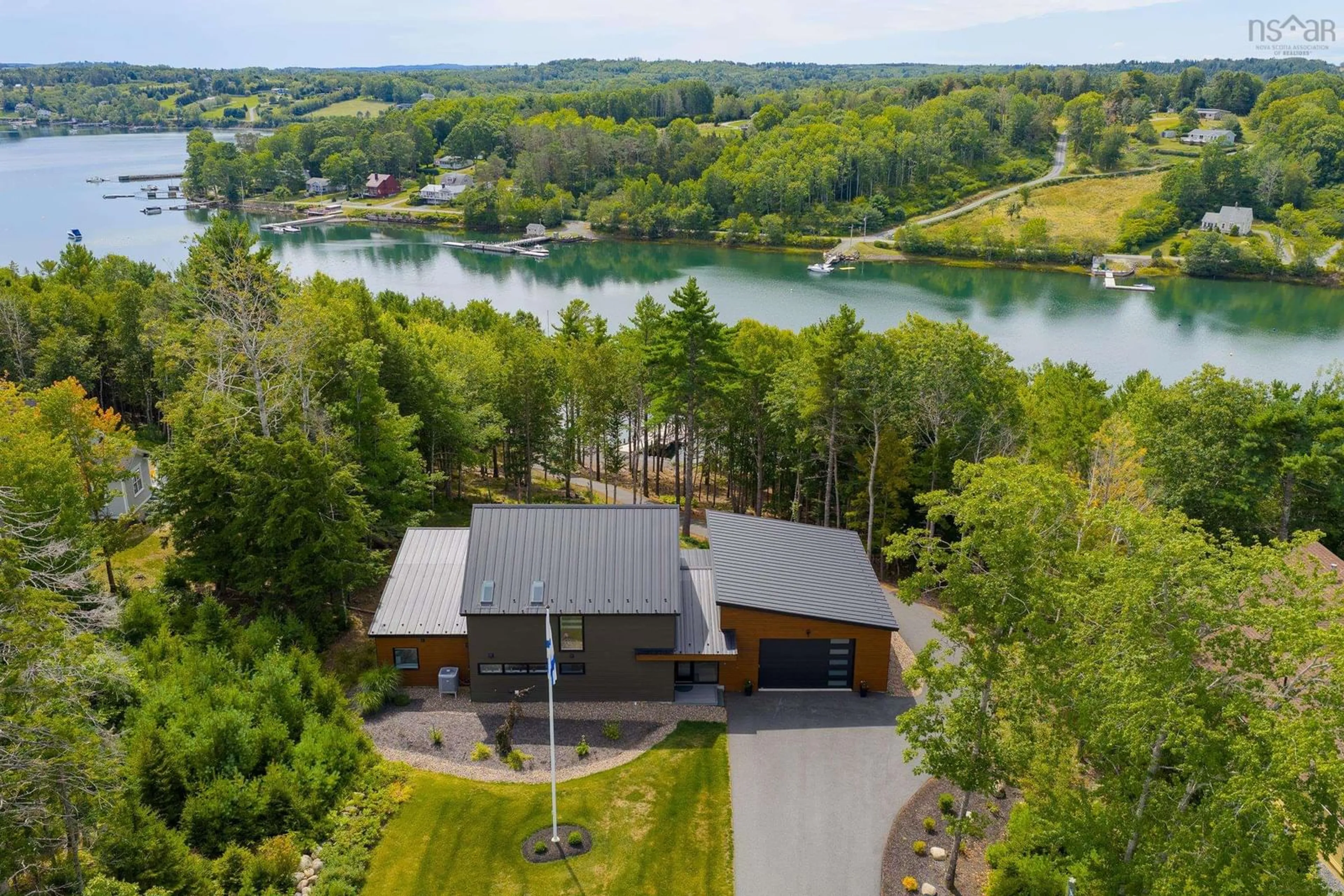 A pic from outside/outdoor area/front of a property/back of a property/a pic from drone, water/lake/river/ocean view for 528 Hermans Island Rd, Herman's Island Nova Scotia B0J 2E0