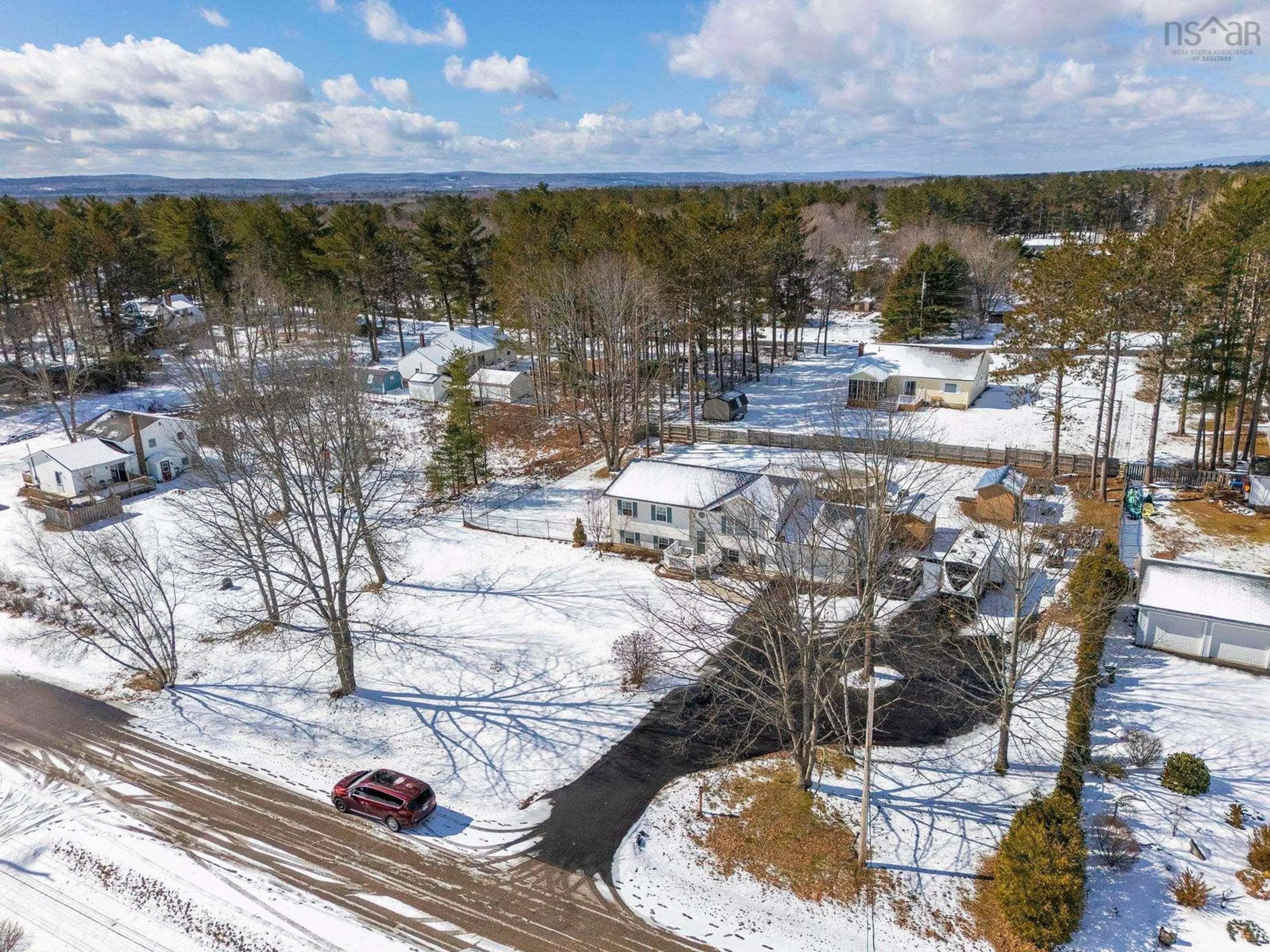 A pic from outside/outdoor area/front of a property/back of a property/a pic from drone, forest/trees view for 23 Valley Rd, Wilmot Nova Scotia B0P 1W0