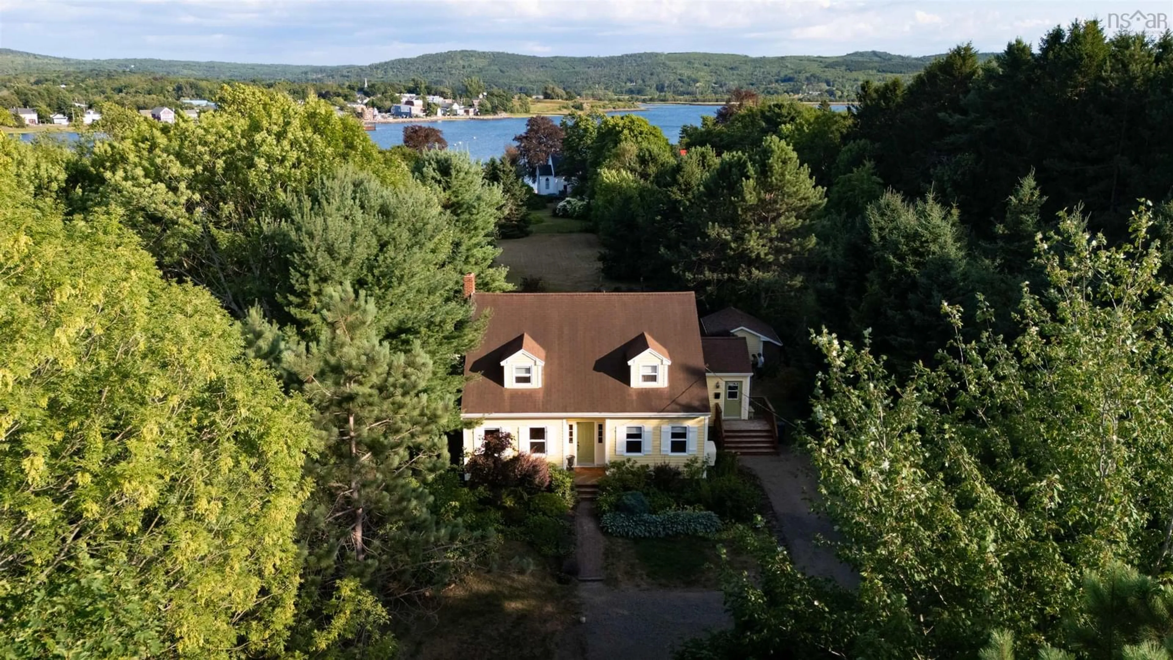 A pic from outside/outdoor area/front of a property/back of a property/a pic from drone, water/lake/river/ocean view for 40 North St, Granville Ferry Nova Scotia B0S 1A0