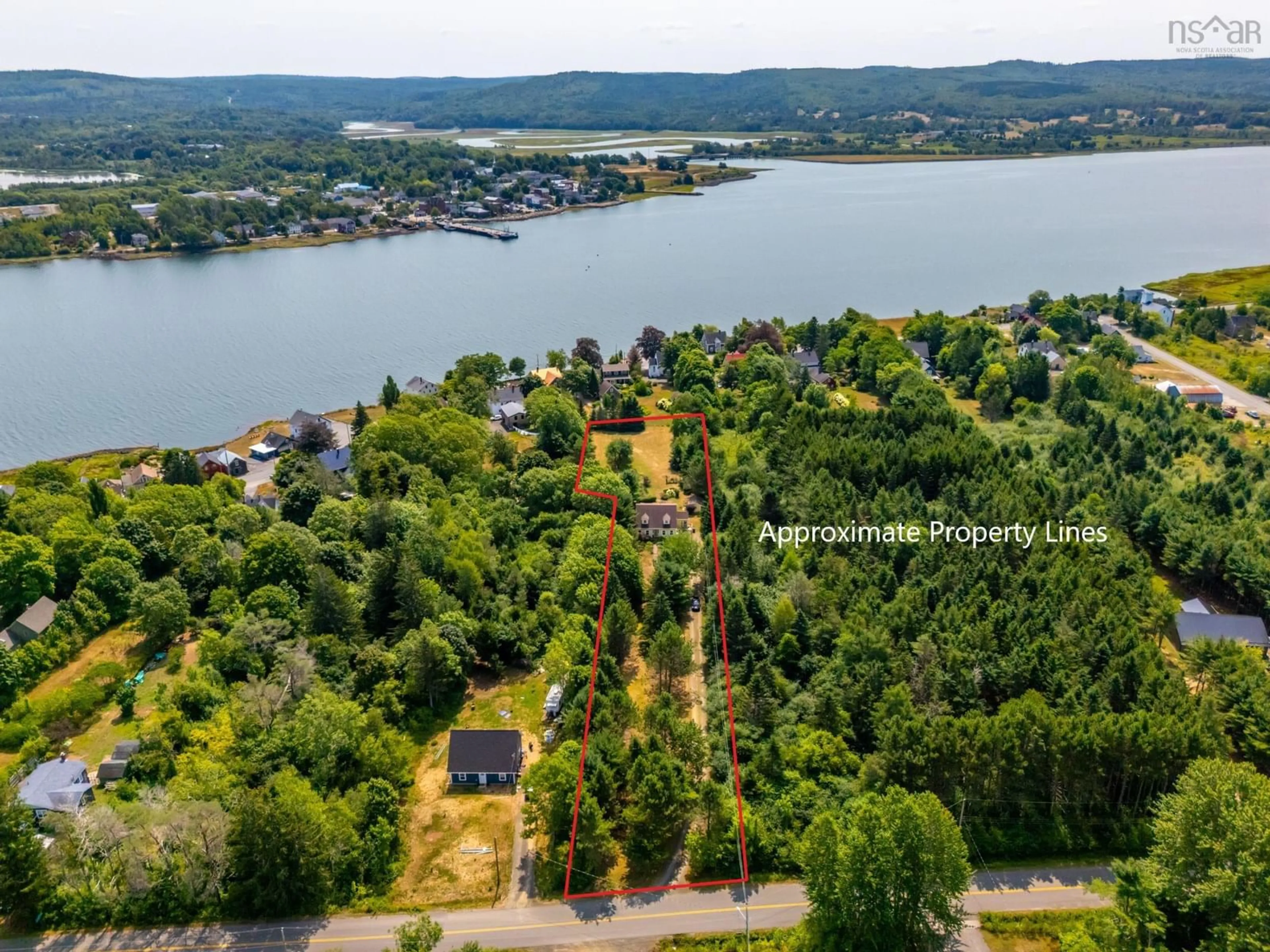 A pic from outside/outdoor area/front of a property/back of a property/a pic from drone, water/lake/river/ocean view for 40 North St, Granville Ferry Nova Scotia B0S 1A0