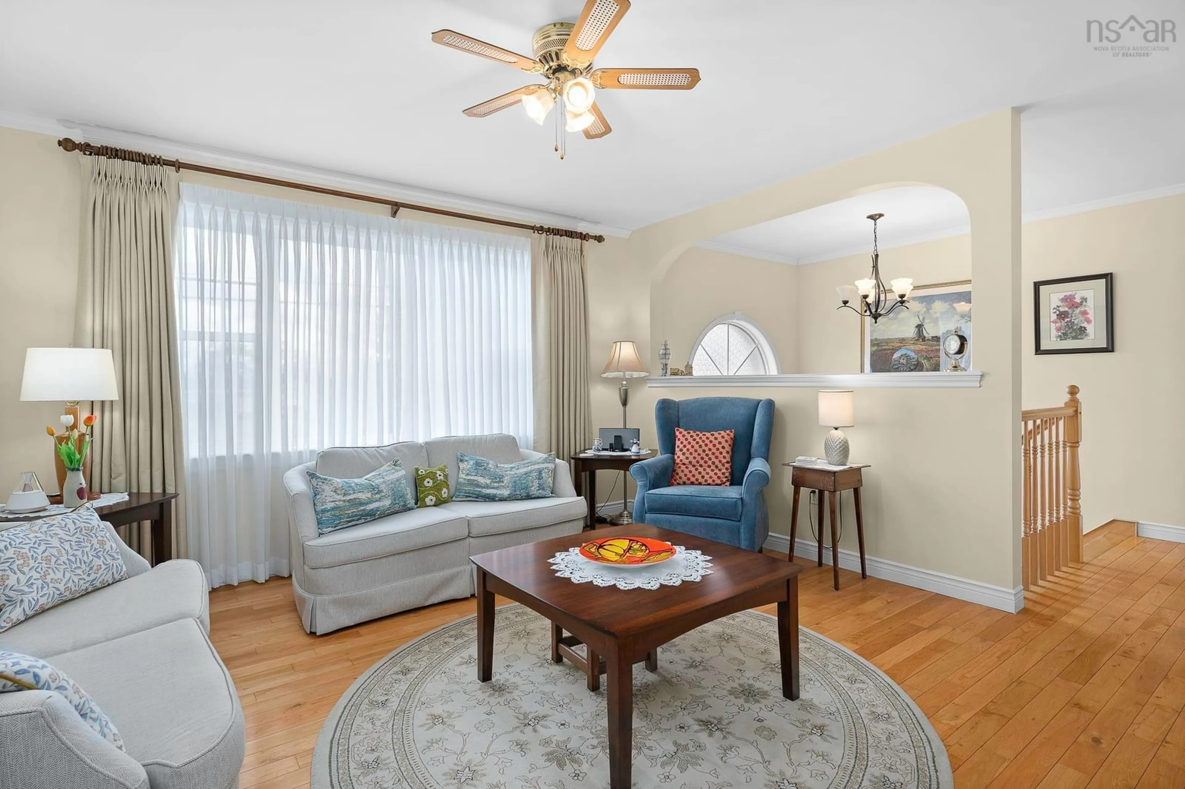 Living room with furniture, wood/laminate floor for 56 Hallmark Ave, Lower Sackville Nova Scotia B4C 3P5