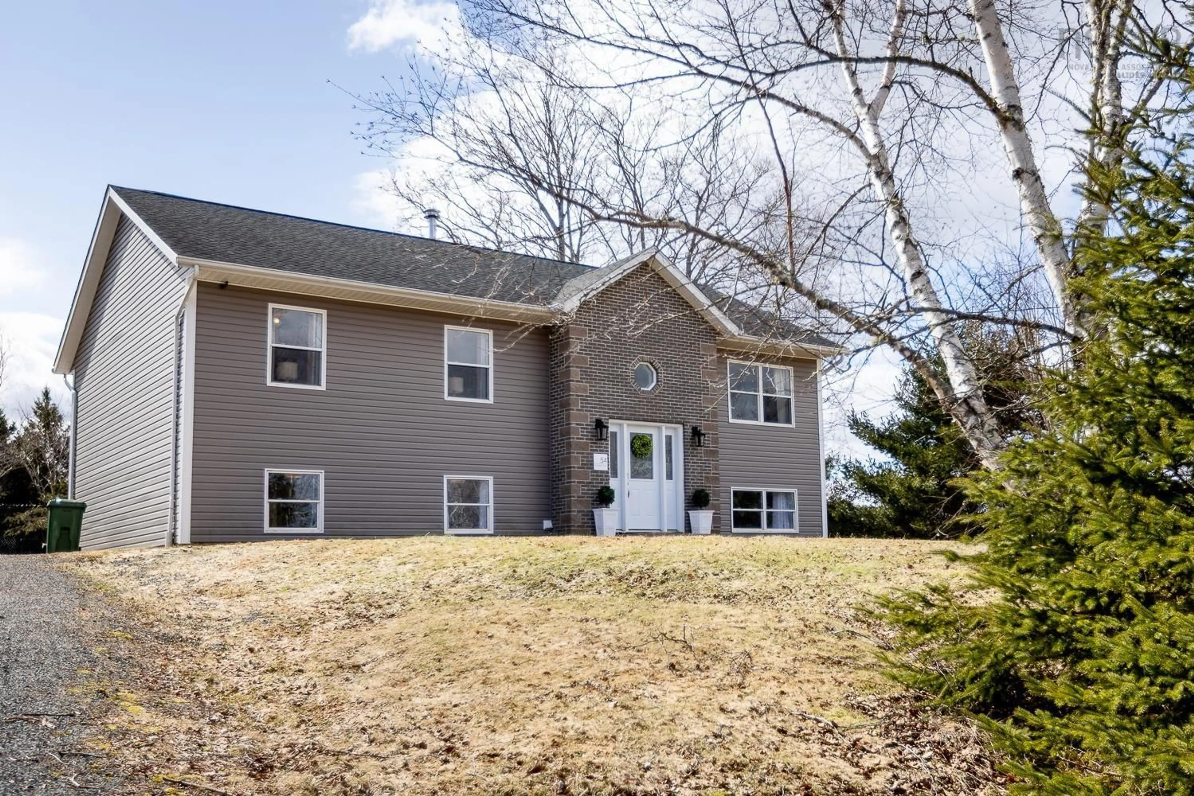 Home with vinyl exterior material, street for 54 Glenabbey Dr, Murray Siding Nova Scotia B6L 3L2