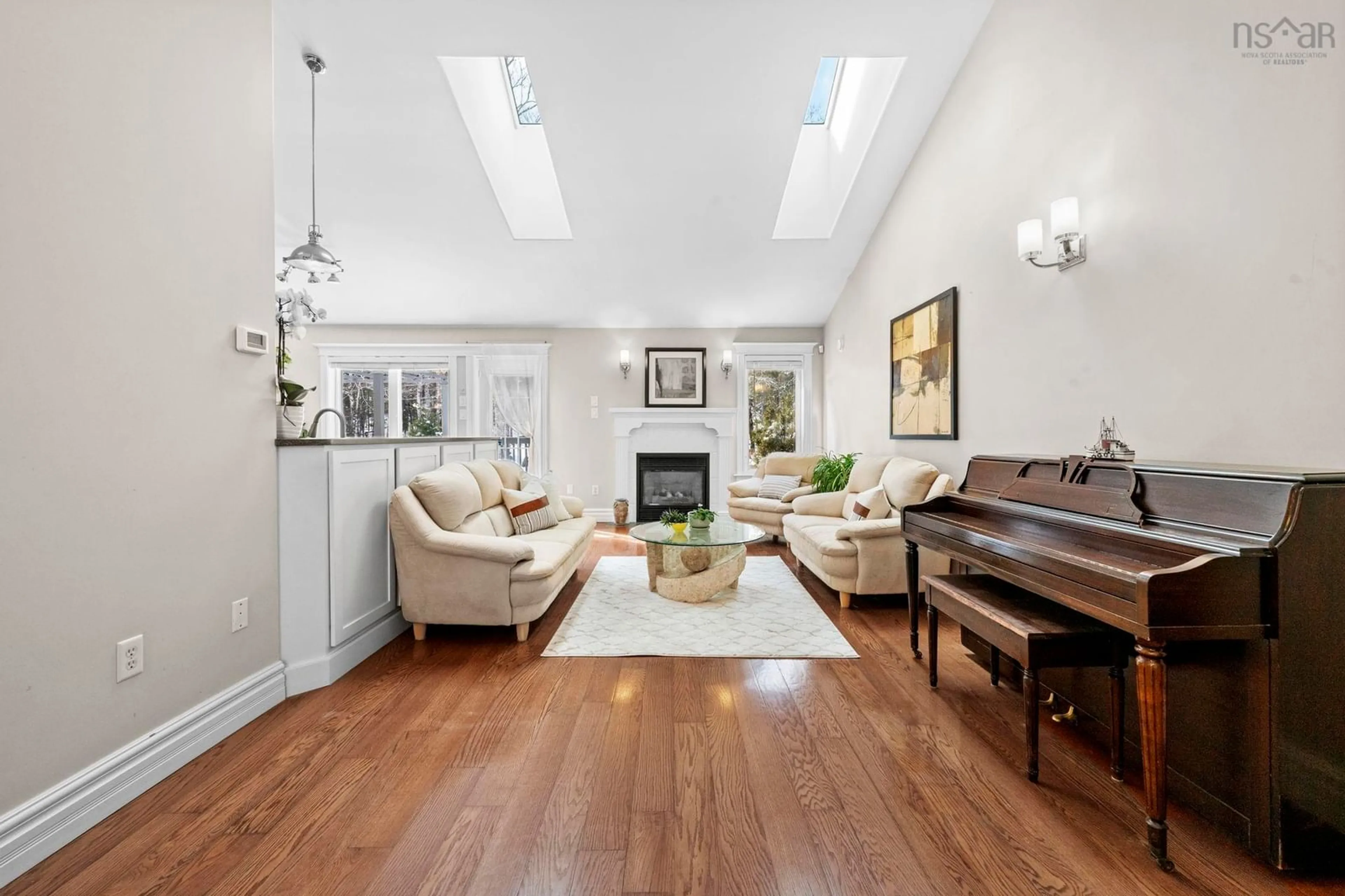 Living room with furniture, wood/laminate floor for 286 Sandy Run, Hammonds Plains Nova Scotia B4B 1X9