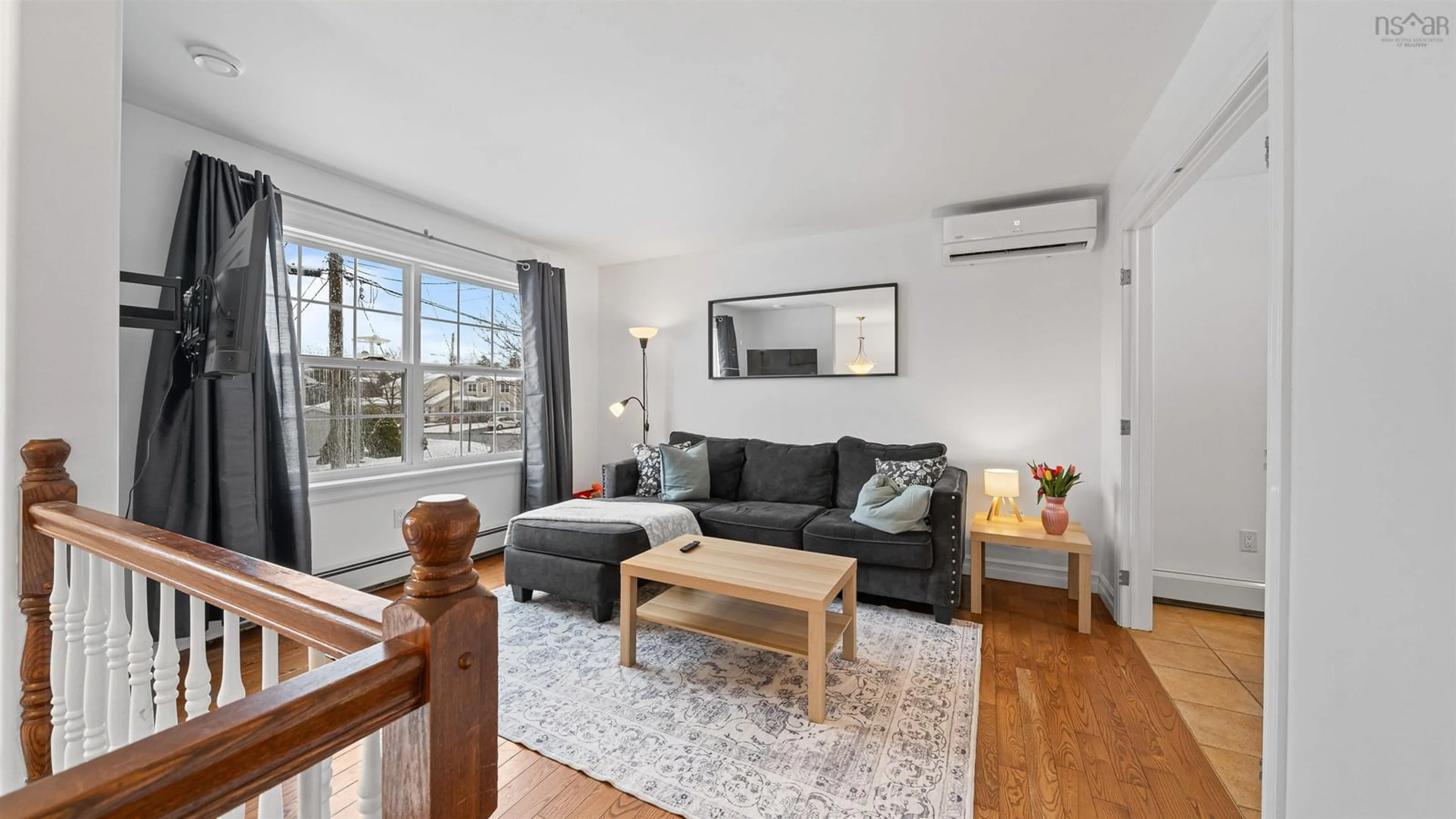 Living room with furniture, wood/laminate floor for 118 Tenon Dr, Middle Sackville Nova Scotia B4E 3J5