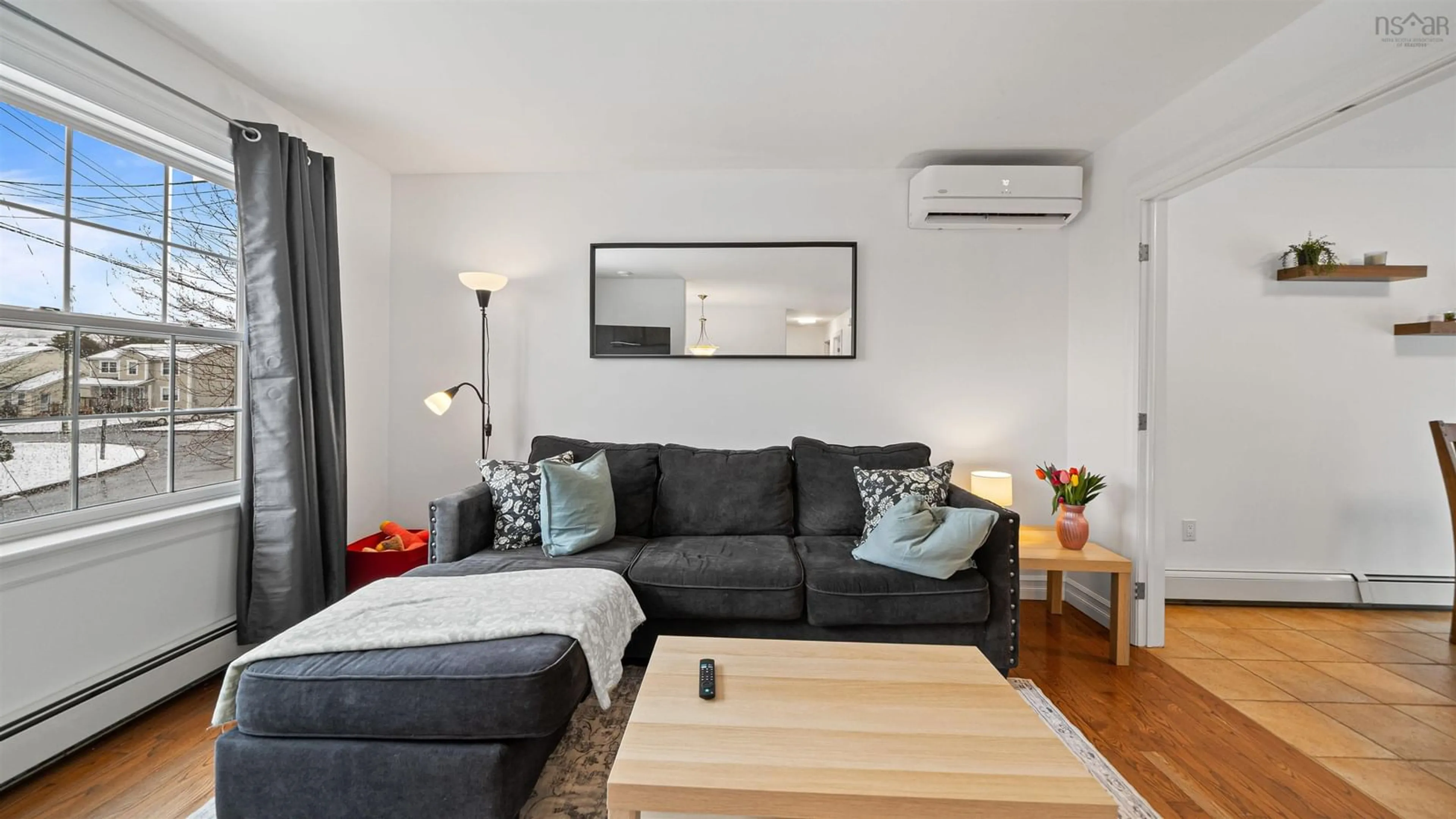 Living room with furniture, wood/laminate floor for 118 Tenon Dr, Middle Sackville Nova Scotia B4E 3J5