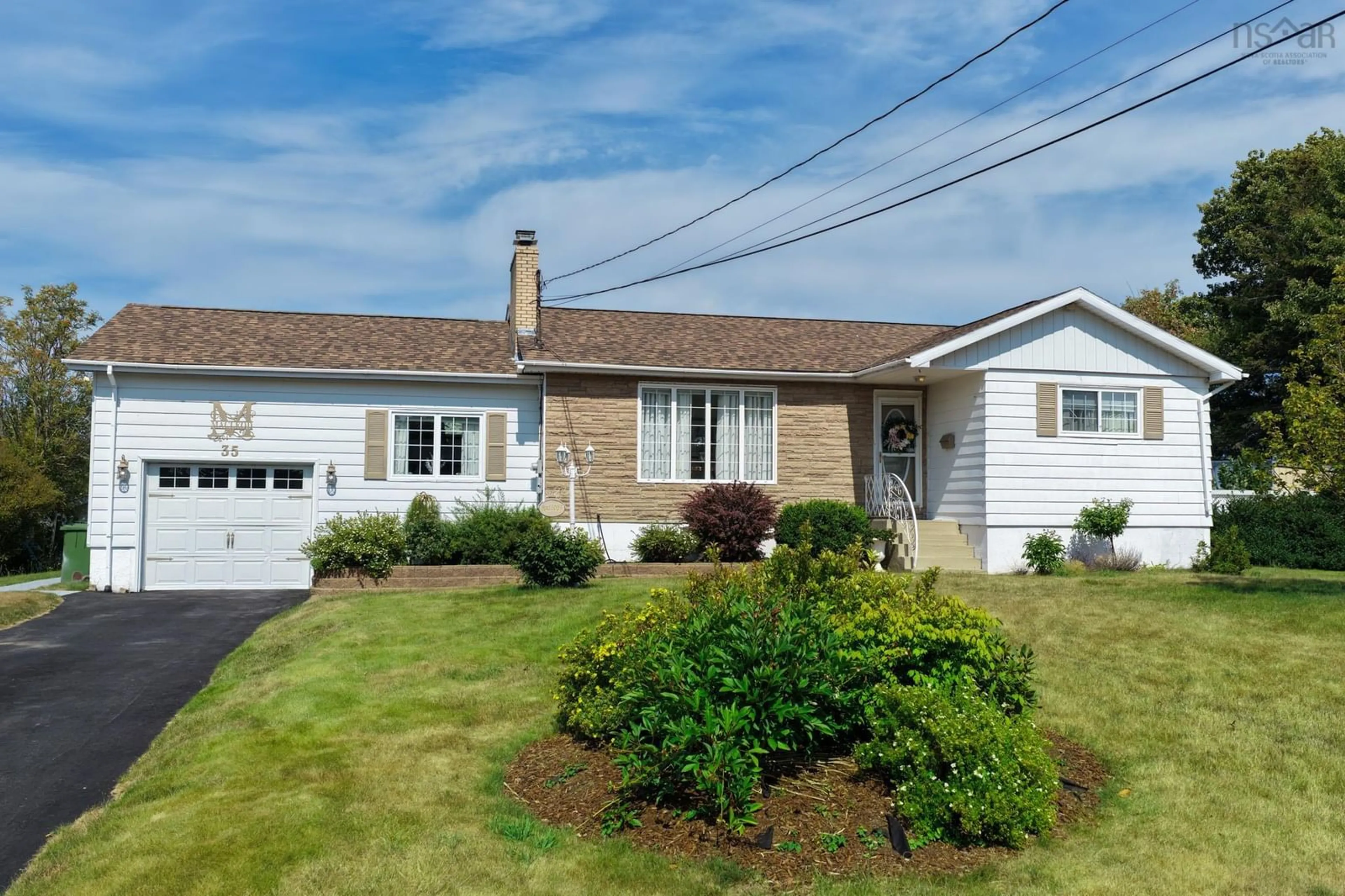 Home with vinyl exterior material, street for 35 Campbell St, North Sydney Nova Scotia B2A 2C6