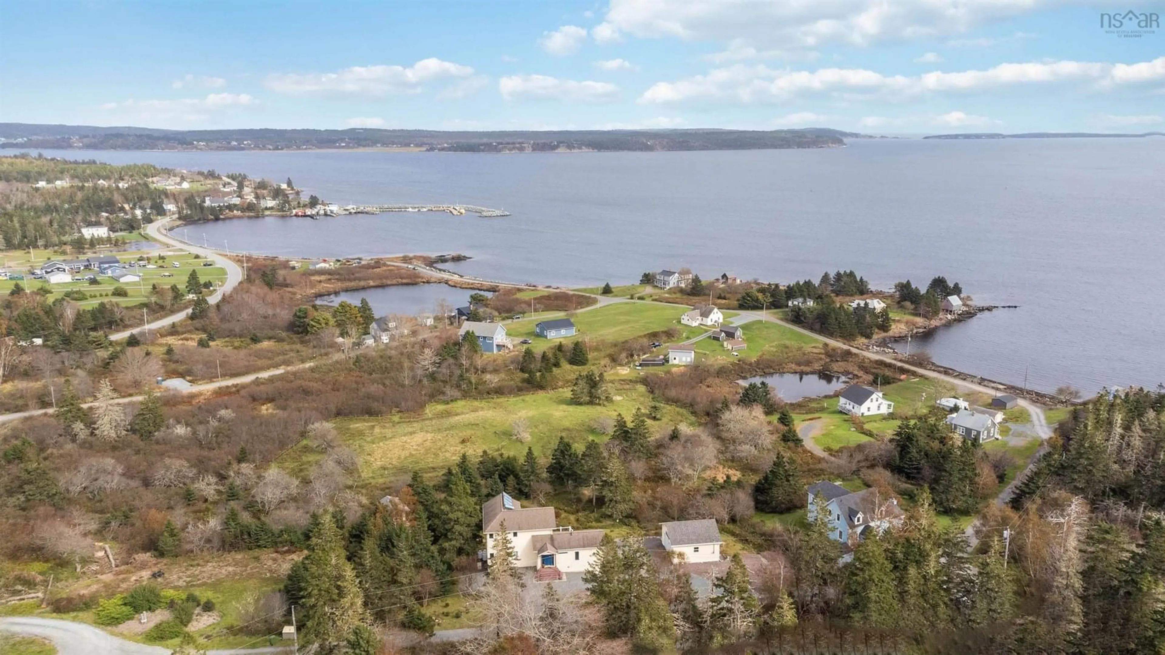 A pic from outside/outdoor area/front of a property/back of a property/a pic from drone, water/lake/river/ocean view for 82 Bells Cove Exten, Dublin Shore Nova Scotia B0R 1C0