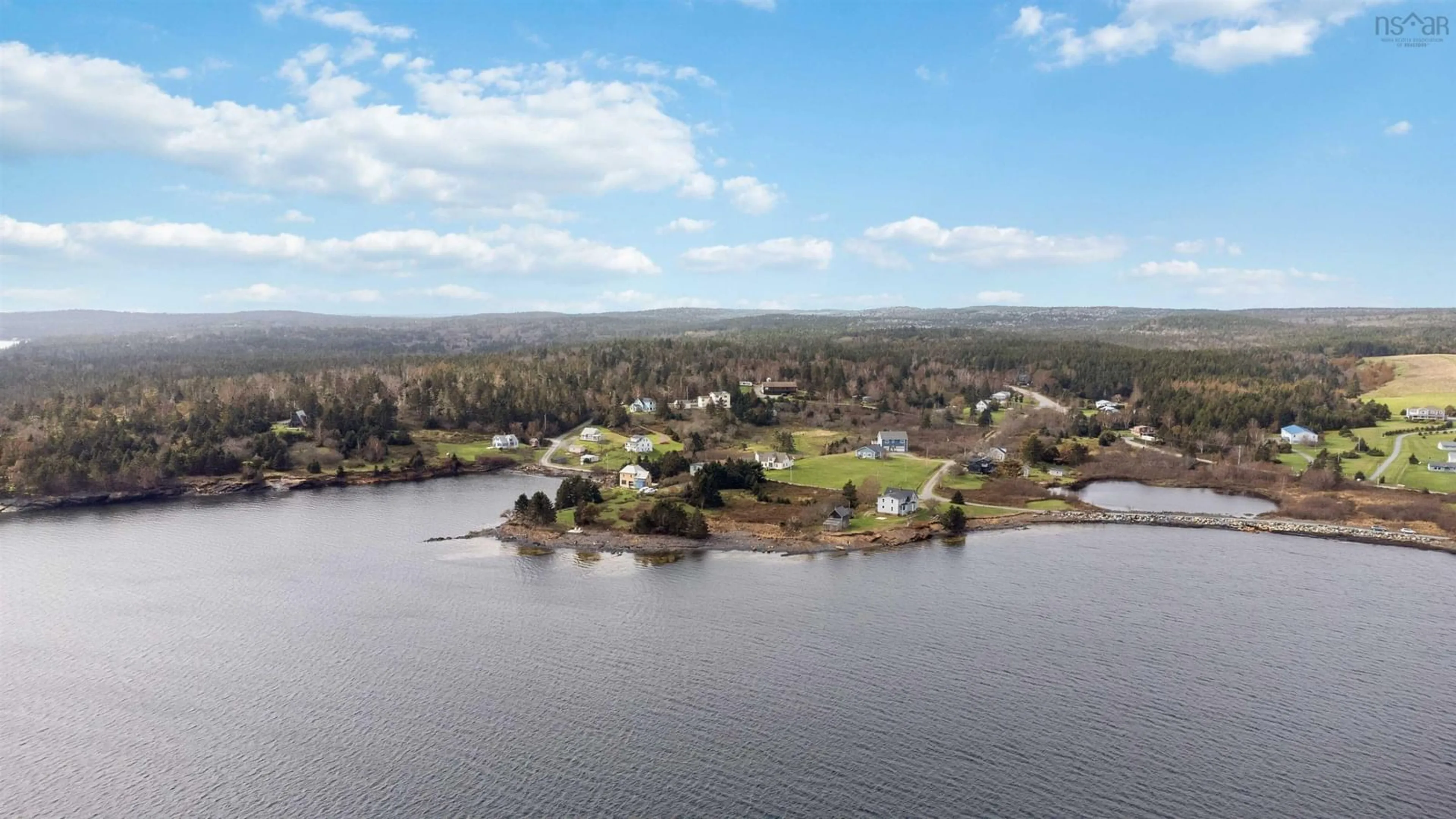 A pic from outside/outdoor area/front of a property/back of a property/a pic from drone, water/lake/river/ocean view for 82 Bells Cove Exten, Dublin Shore Nova Scotia B0R 1C0