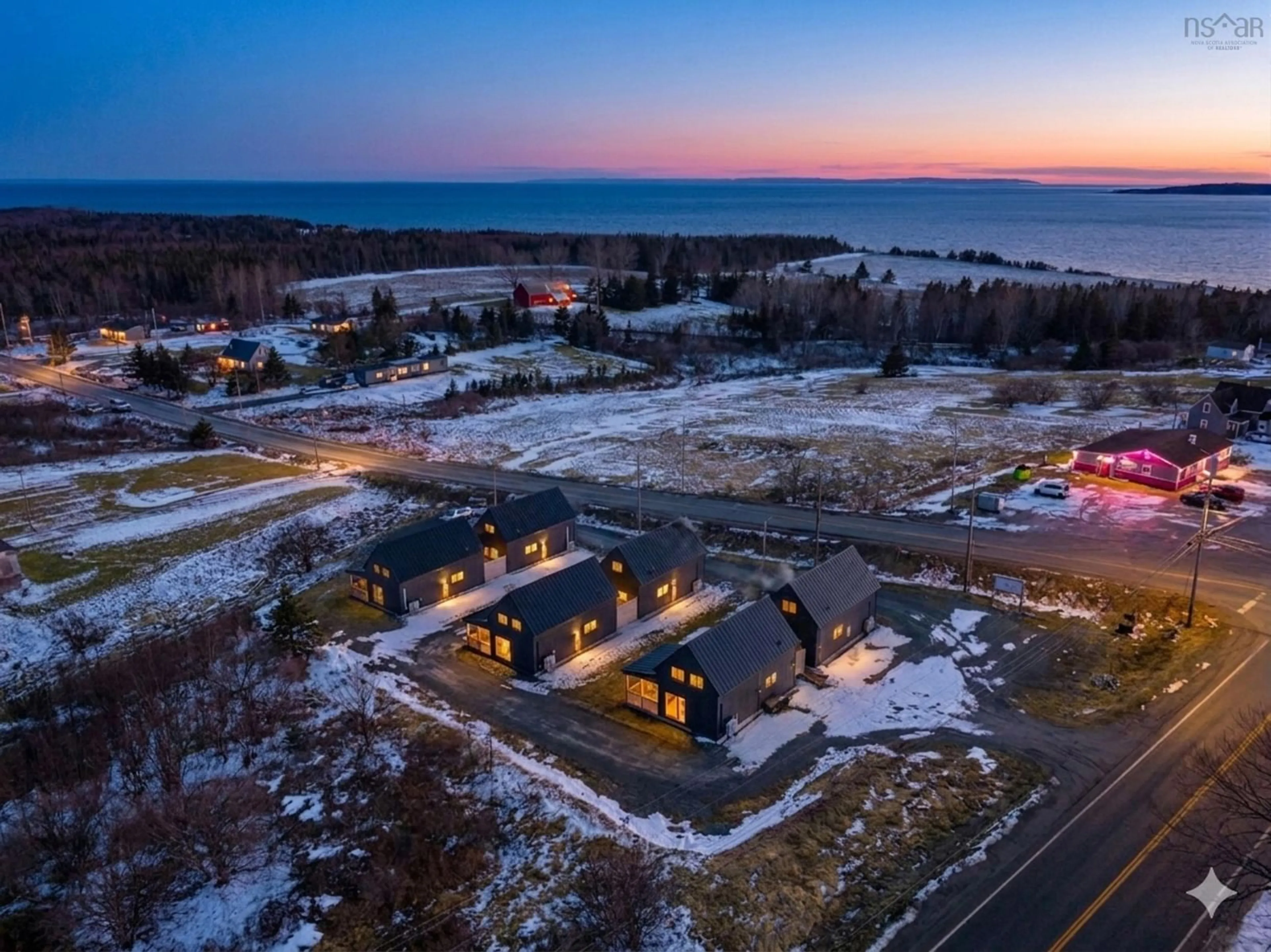 A pic from outside/outdoor area/front of a property/back of a property/a pic from drone, water/lake/river/ocean view for 15 Shore Rd, Harbourview Nova Scotia B0E 2W0