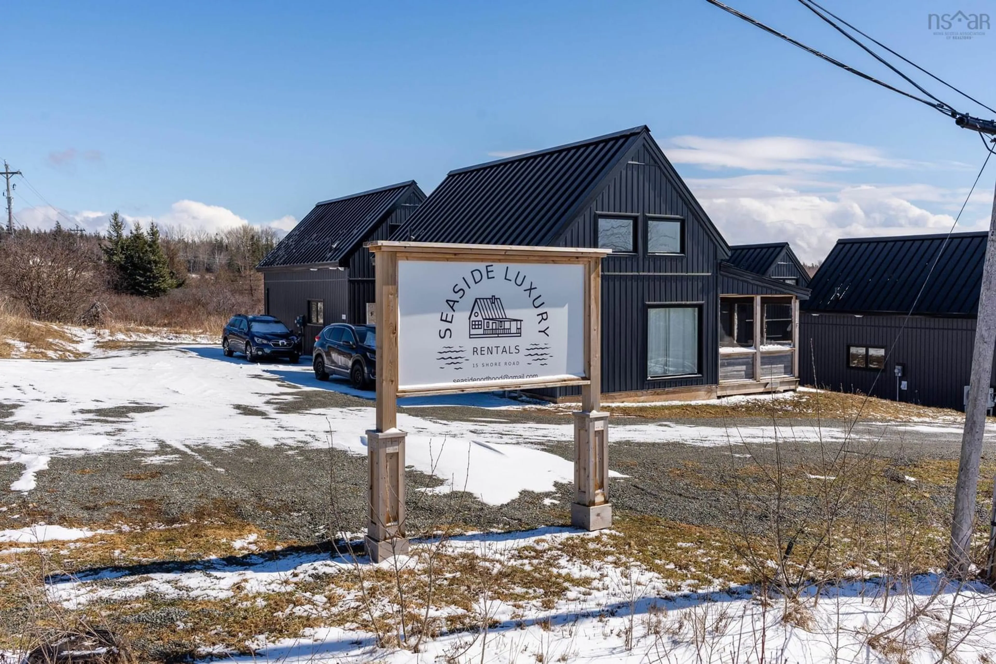A pic from outside/outdoor area/front of a property/back of a property/a pic from drone, mountain view for 15 Shore Rd, Harbourview Nova Scotia B0E 2W0