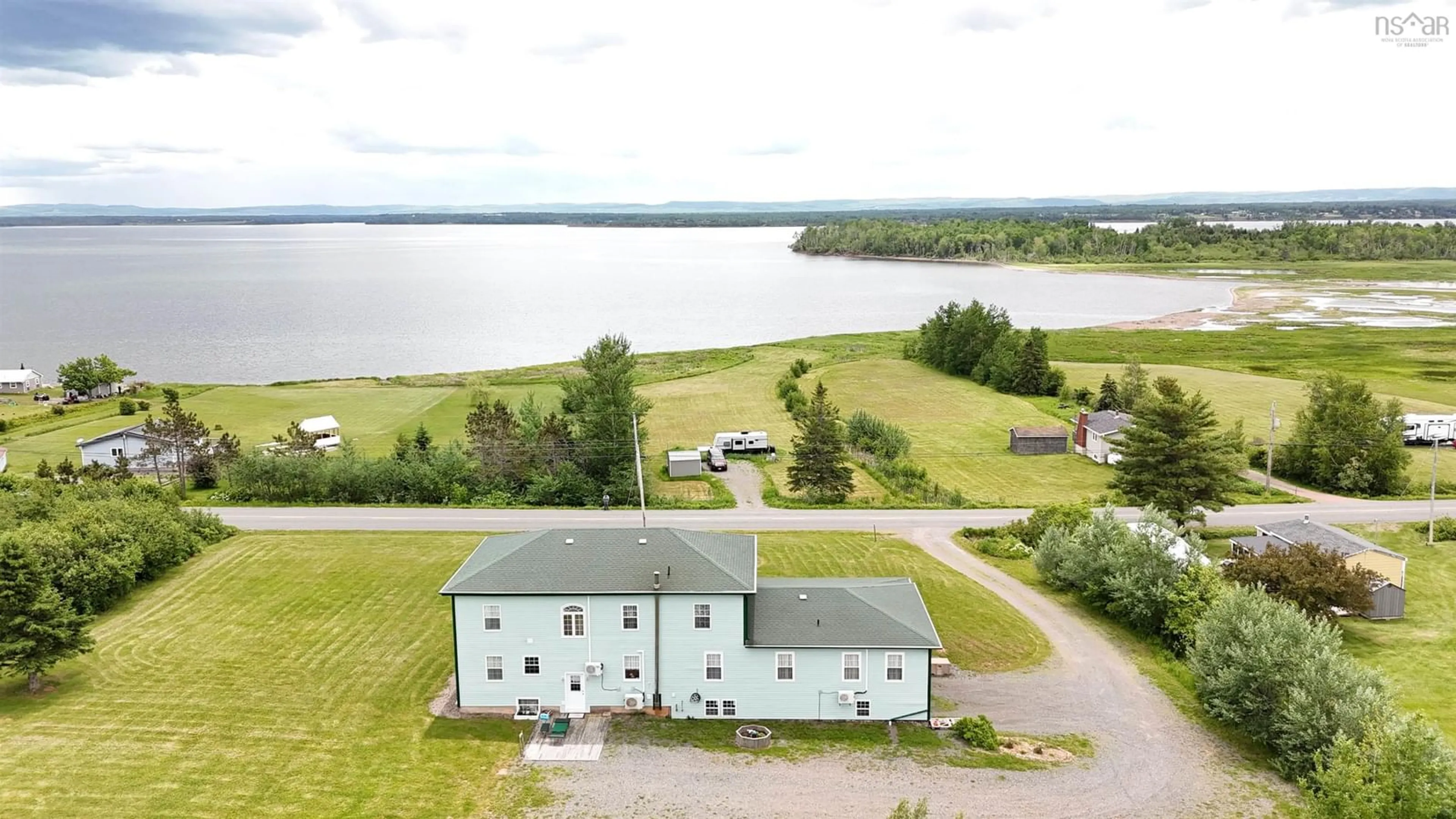 A pic from outside/outdoor area/front of a property/back of a property/a pic from drone, water/lake/river/ocean view for 2901 Malagash Rd, Malagash Centre Nova Scotia B0K 1E0