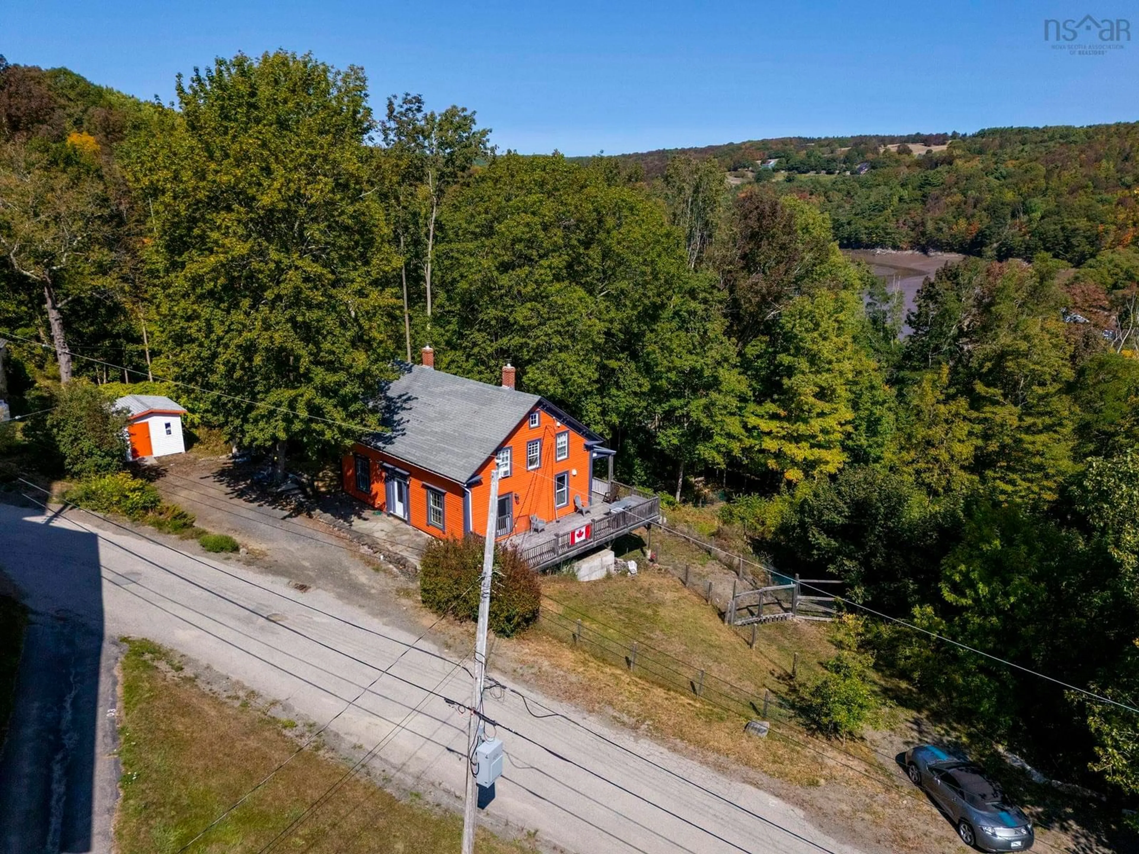 A pic from outside/outdoor area/front of a property/back of a property/a pic from drone, building for 40 Pleasant St, Bear River Nova Scotia B0S 1B0