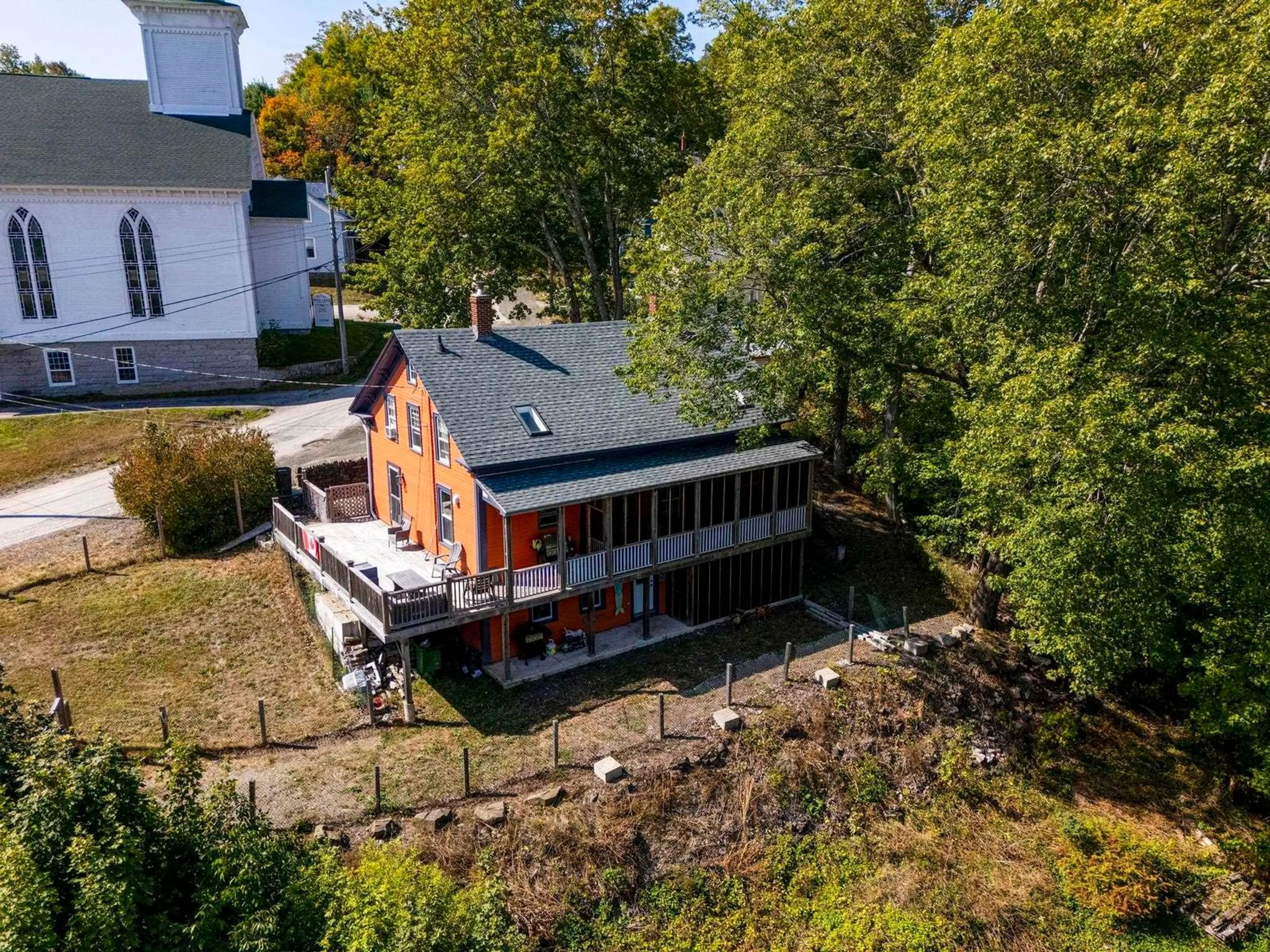 A pic from outside/outdoor area/front of a property/back of a property/a pic from drone, building for 40 Pleasant St, Bear River Nova Scotia B0S 1B0